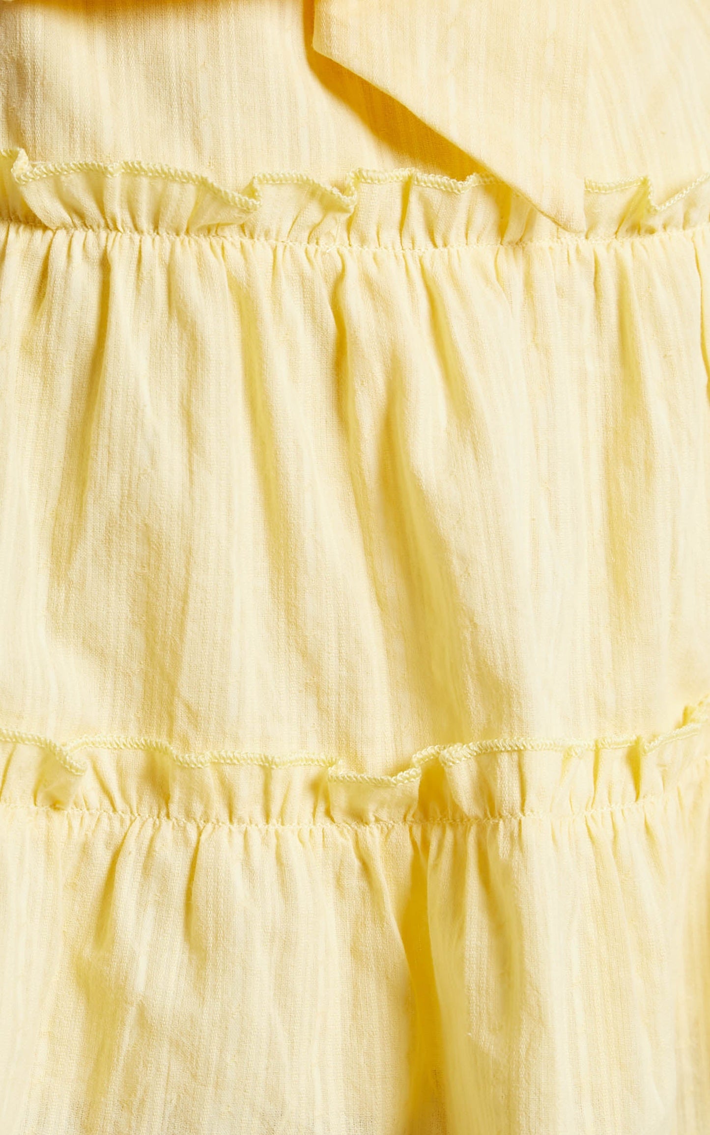 Maryani Backless Tiered Halter Mini Dress in Pastel Yellow