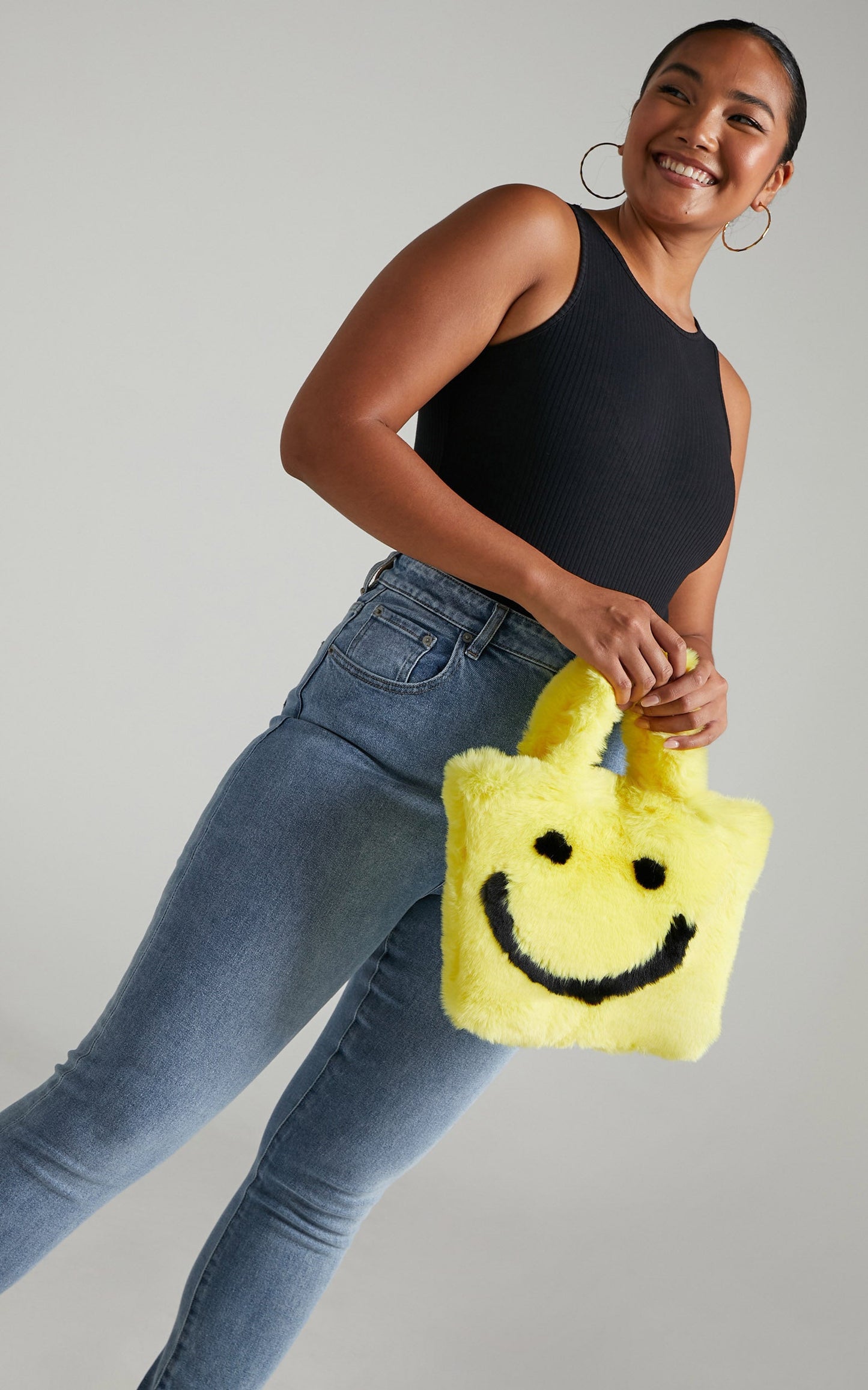 Jamiyah Faux Fur Smiley Face Bucket Bag in Yellow