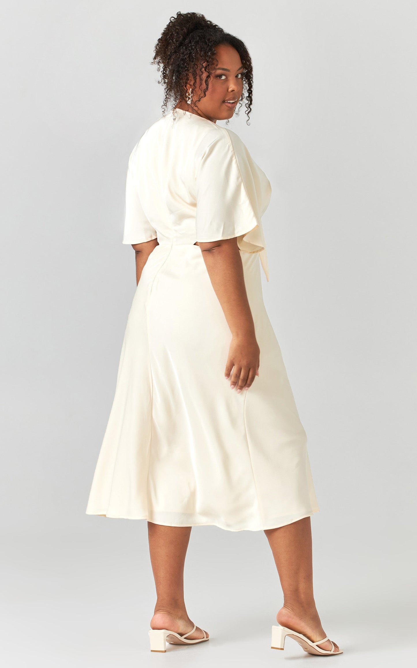 Joja Flutter Sleeve Cut Out Midi Dress in Cream