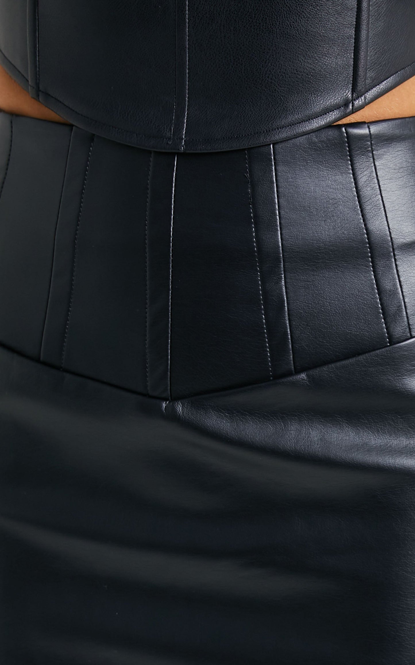 Juvylenn High Waisted Faux Leather Mini Skirt in Black