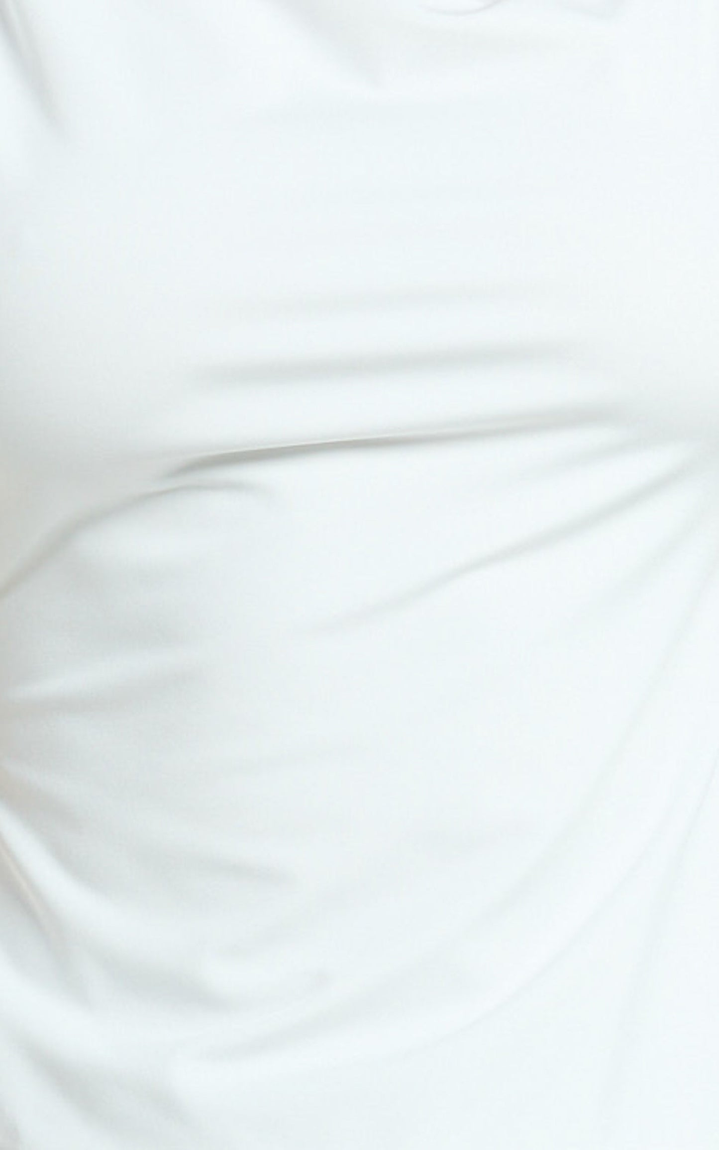 Lausanne Top - Asymmetric Jersey Backless Top With Hardware Detail in Off White