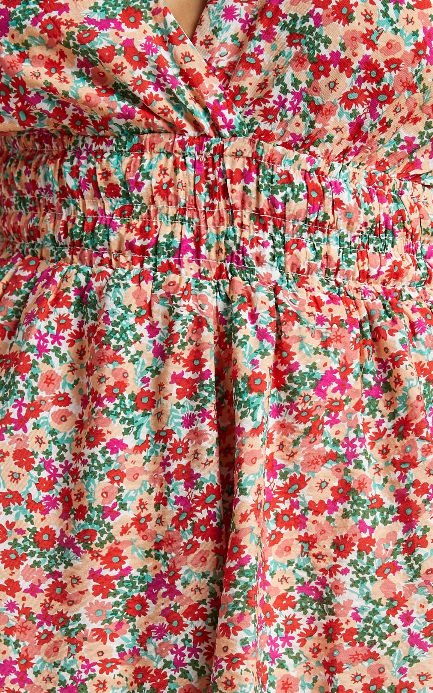 Mila Long Flared Sleeve Playsuit in White Floral