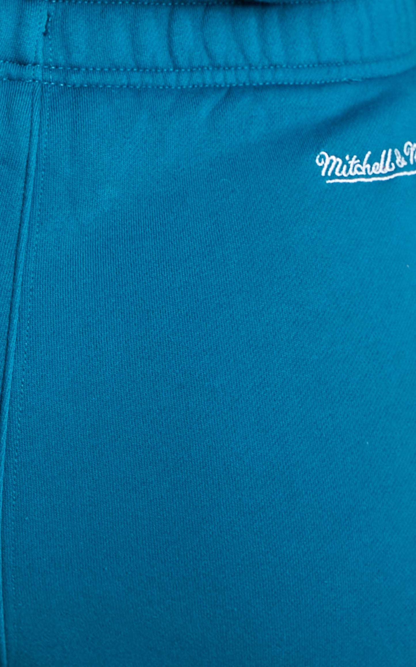 Mitchell & Ness - Mid Rise Miami Dolphins Arched Logo Sweat Pants in Faded Teal