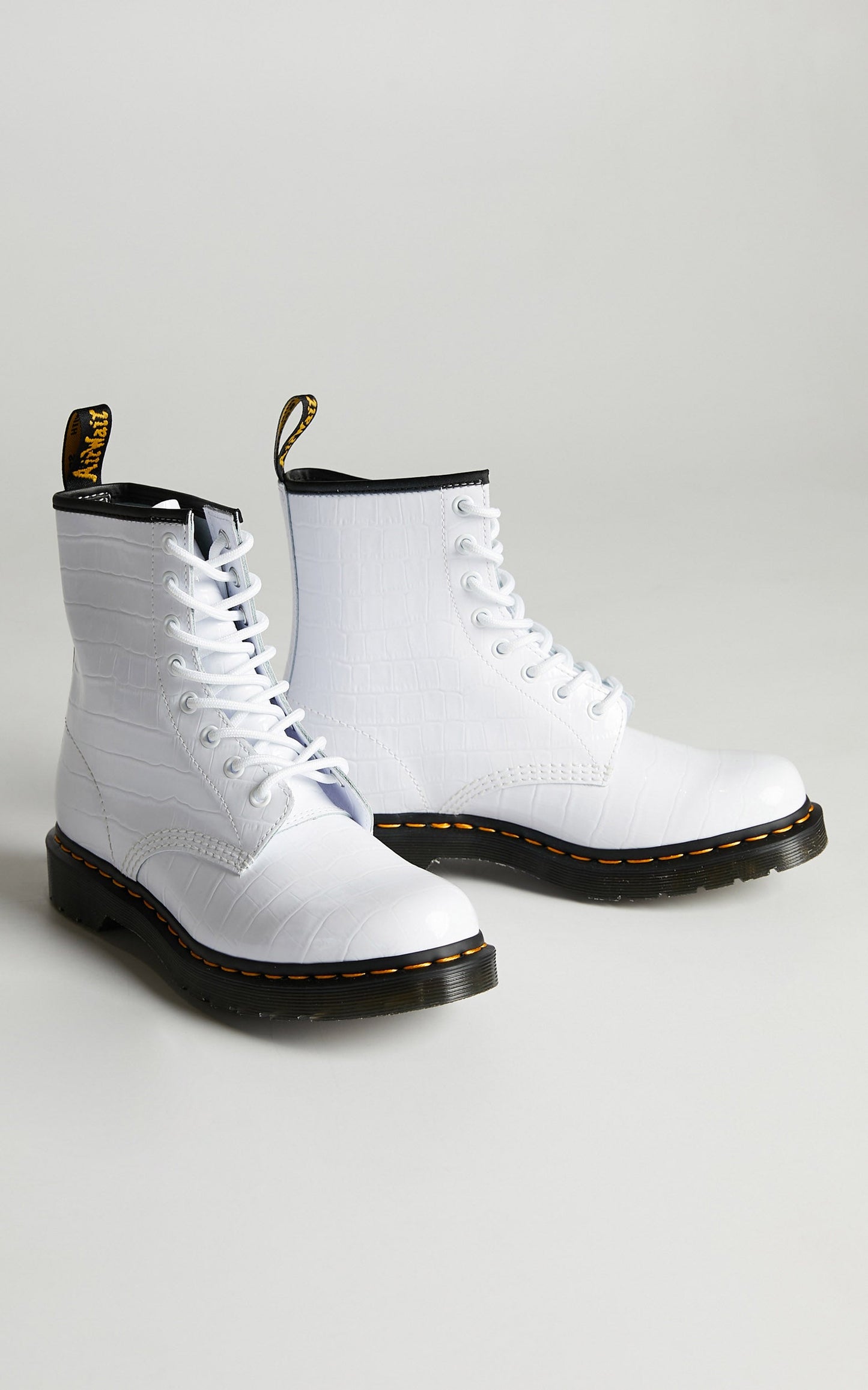 Dr. Martens - 1460 W 8 Eye Boot in White Patent Lamper Croc Emboss
