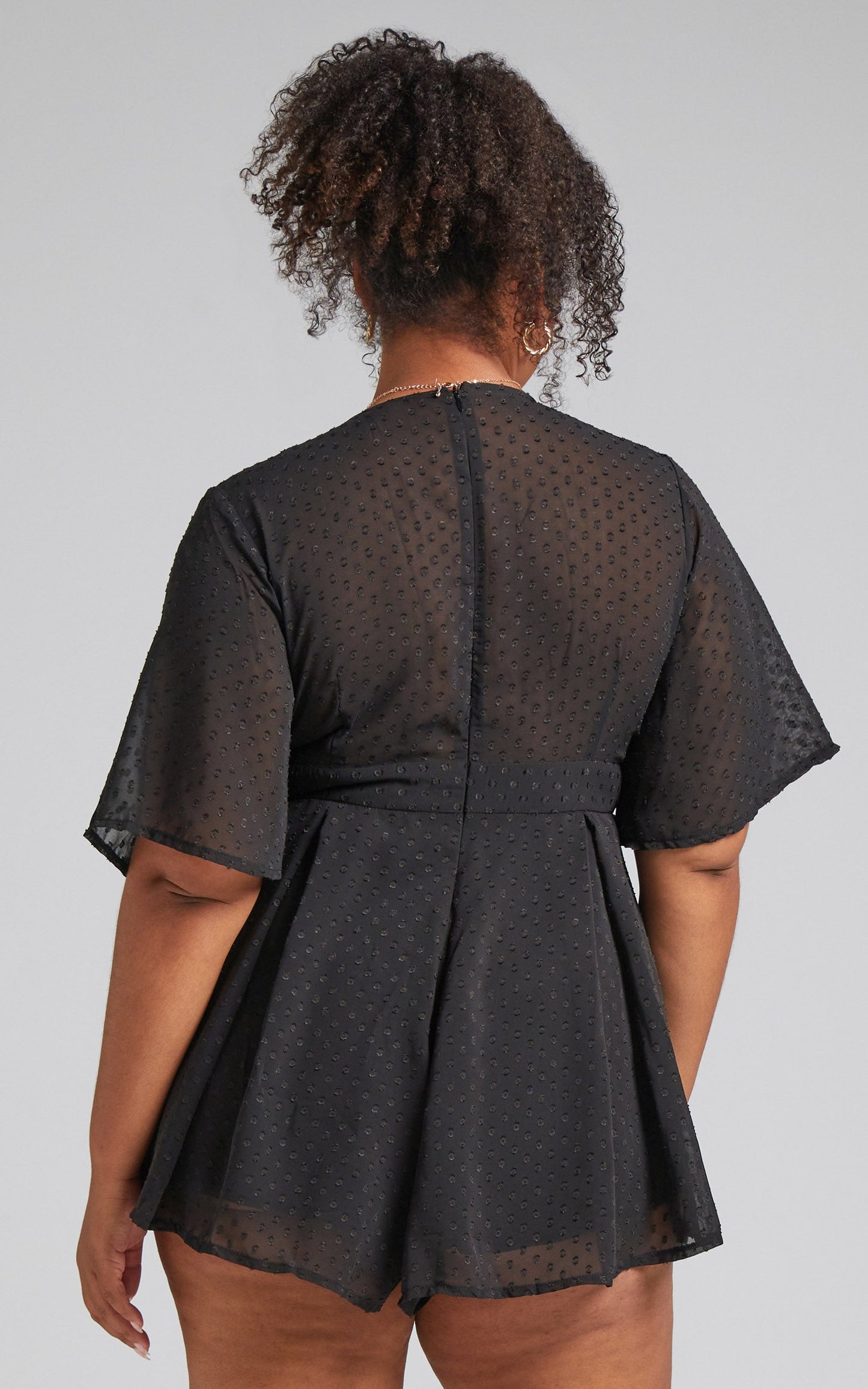 Chains Hit My Chest Plunge Mini Playsuit in Black