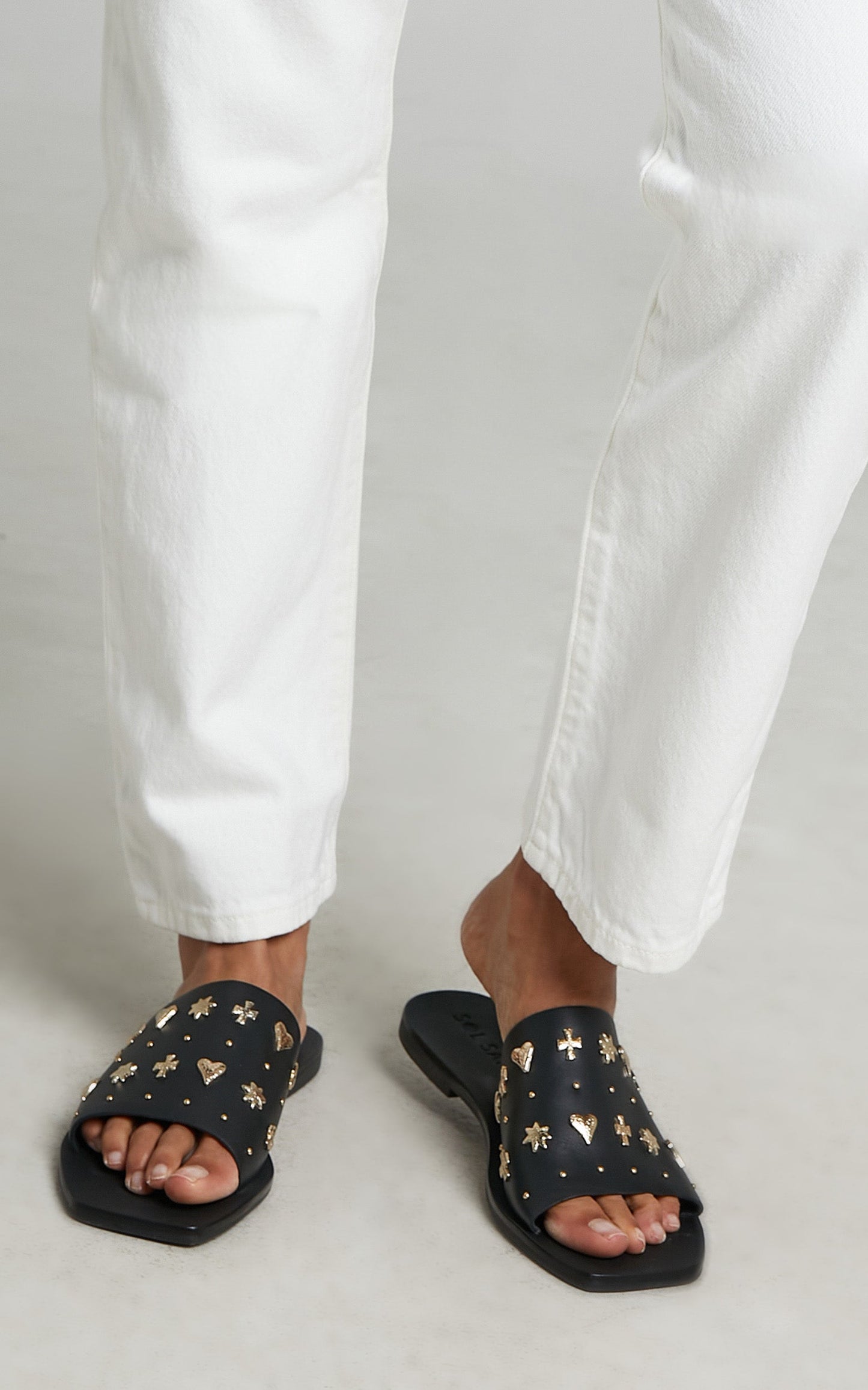 Sol Sana - Mila Slide Sandals in Black and Gold
