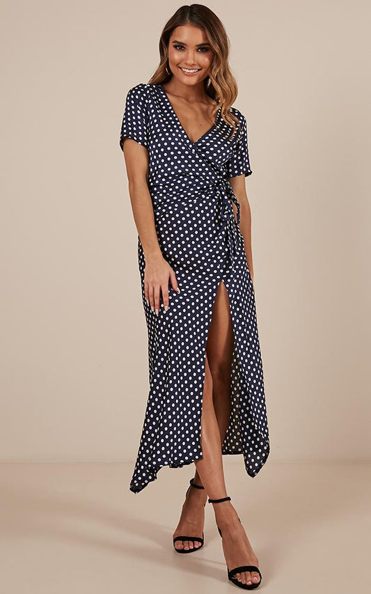 Laying Low Wrap Dress In Navy Polka Dot Satin