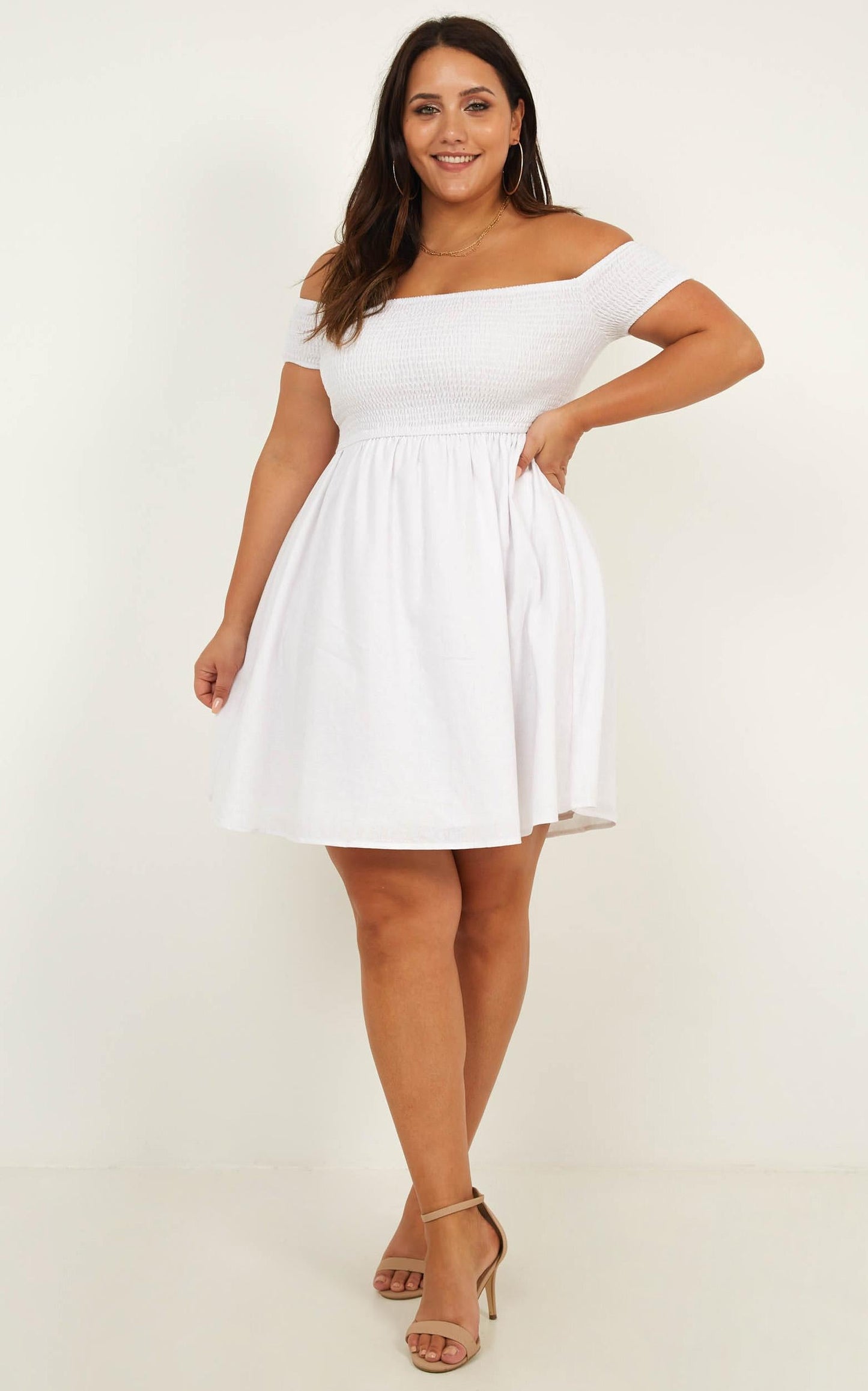 Cooler Than Her Dress In White Linen Look