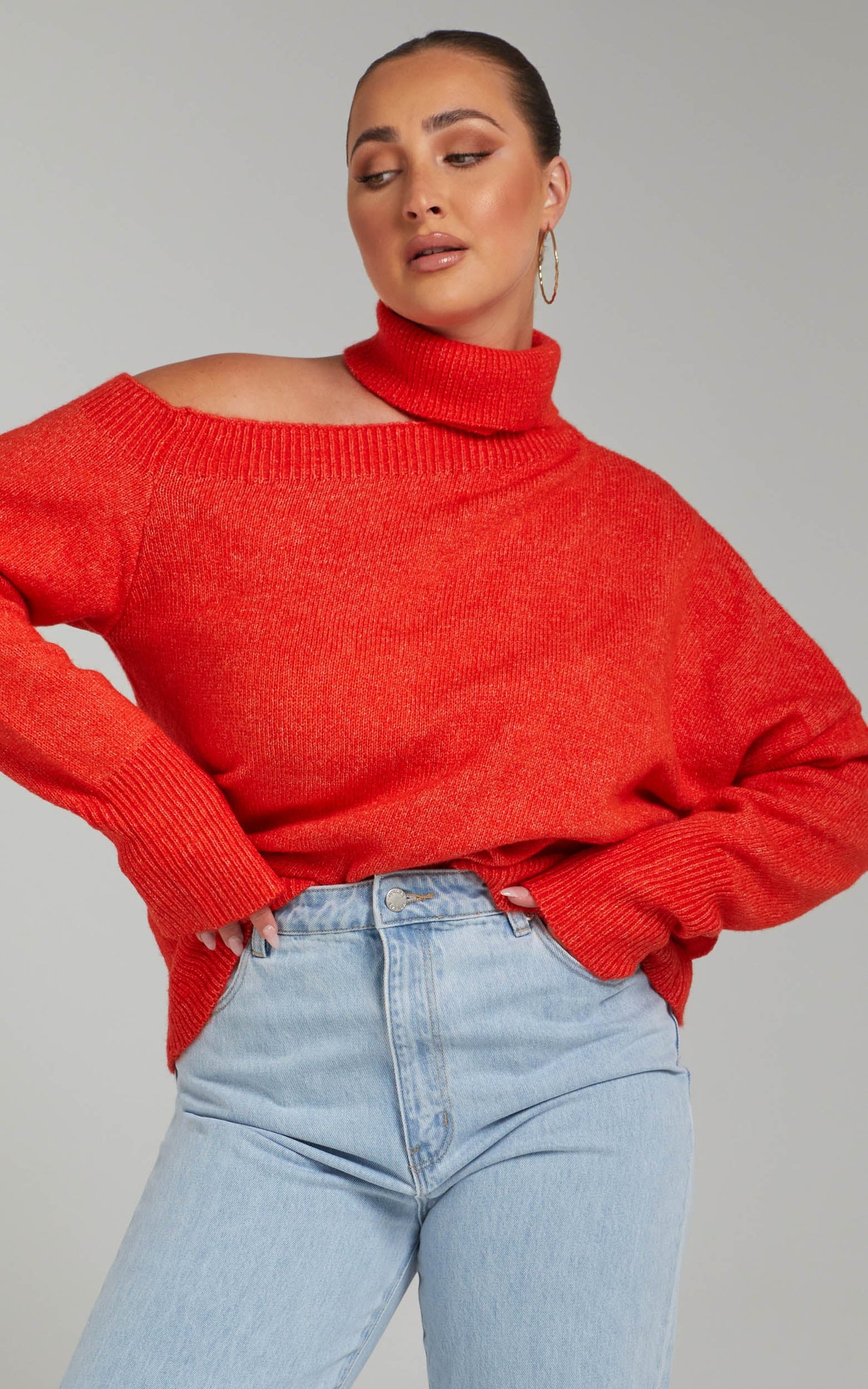 Ceila Knit Top with Shoulder Cut Out in Orange