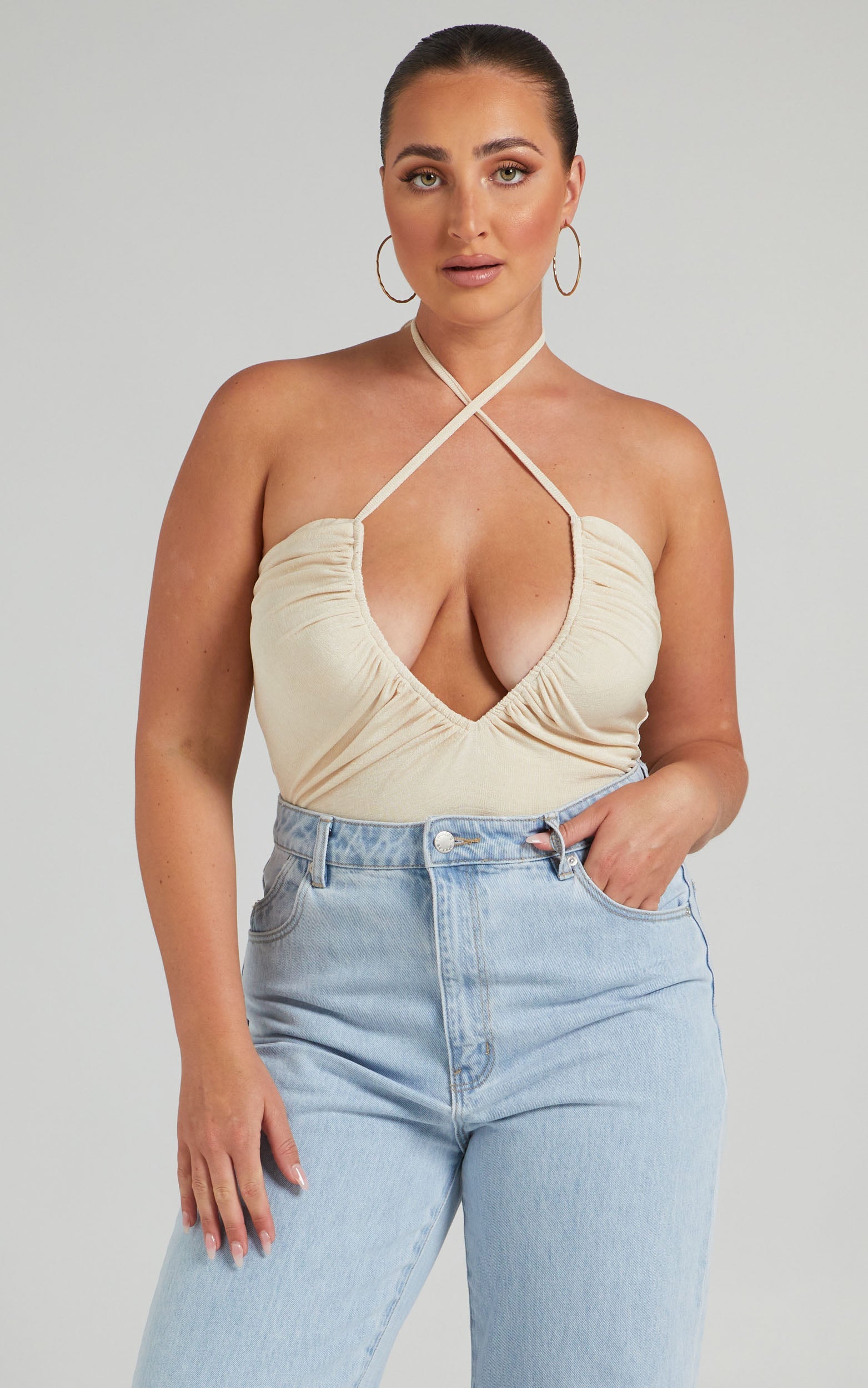 Victorie Plunge Neck Ruched Bodysuit in Cream