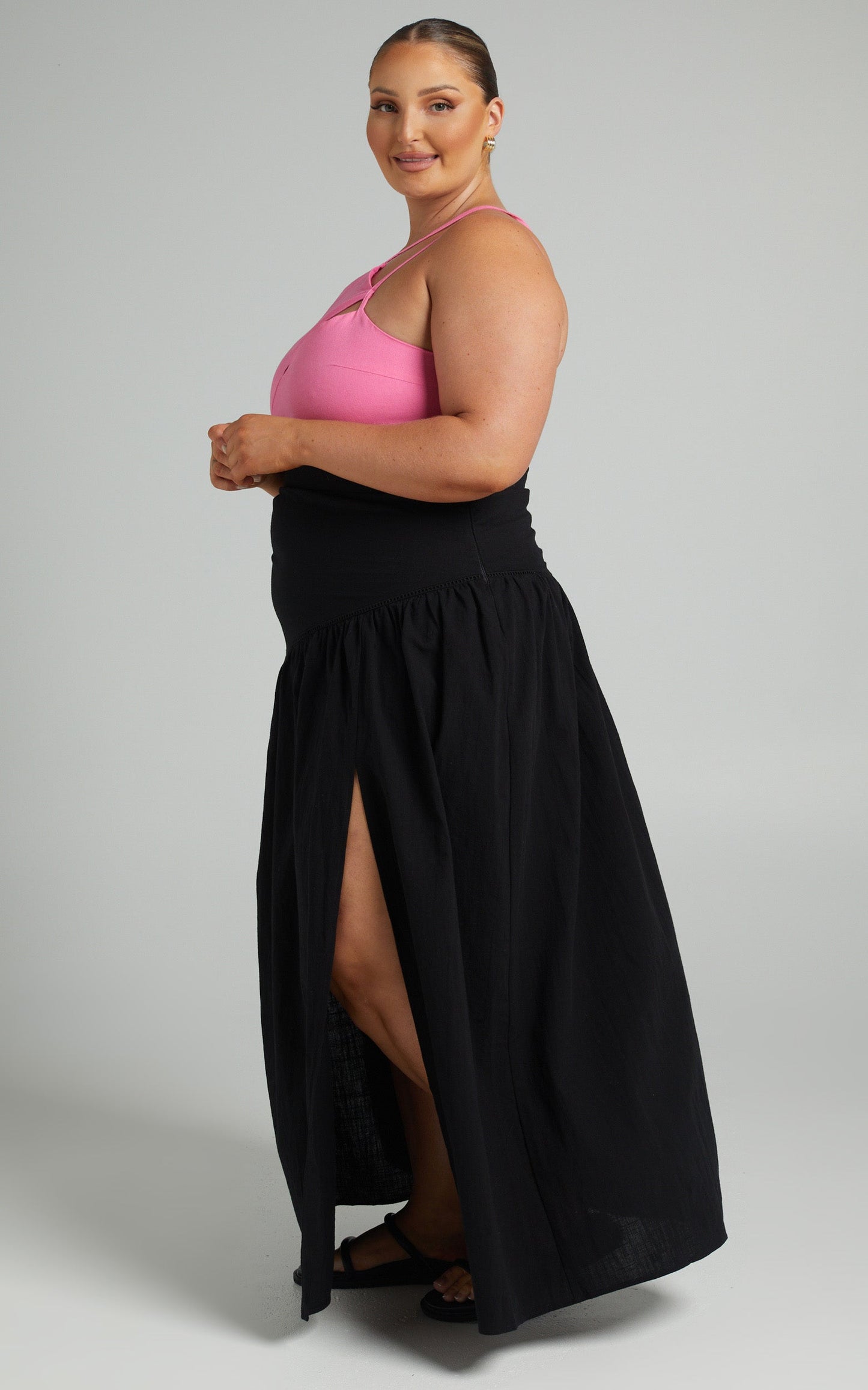 Jalena Thigh Slit Asymmetric Maxi Skirt in Black