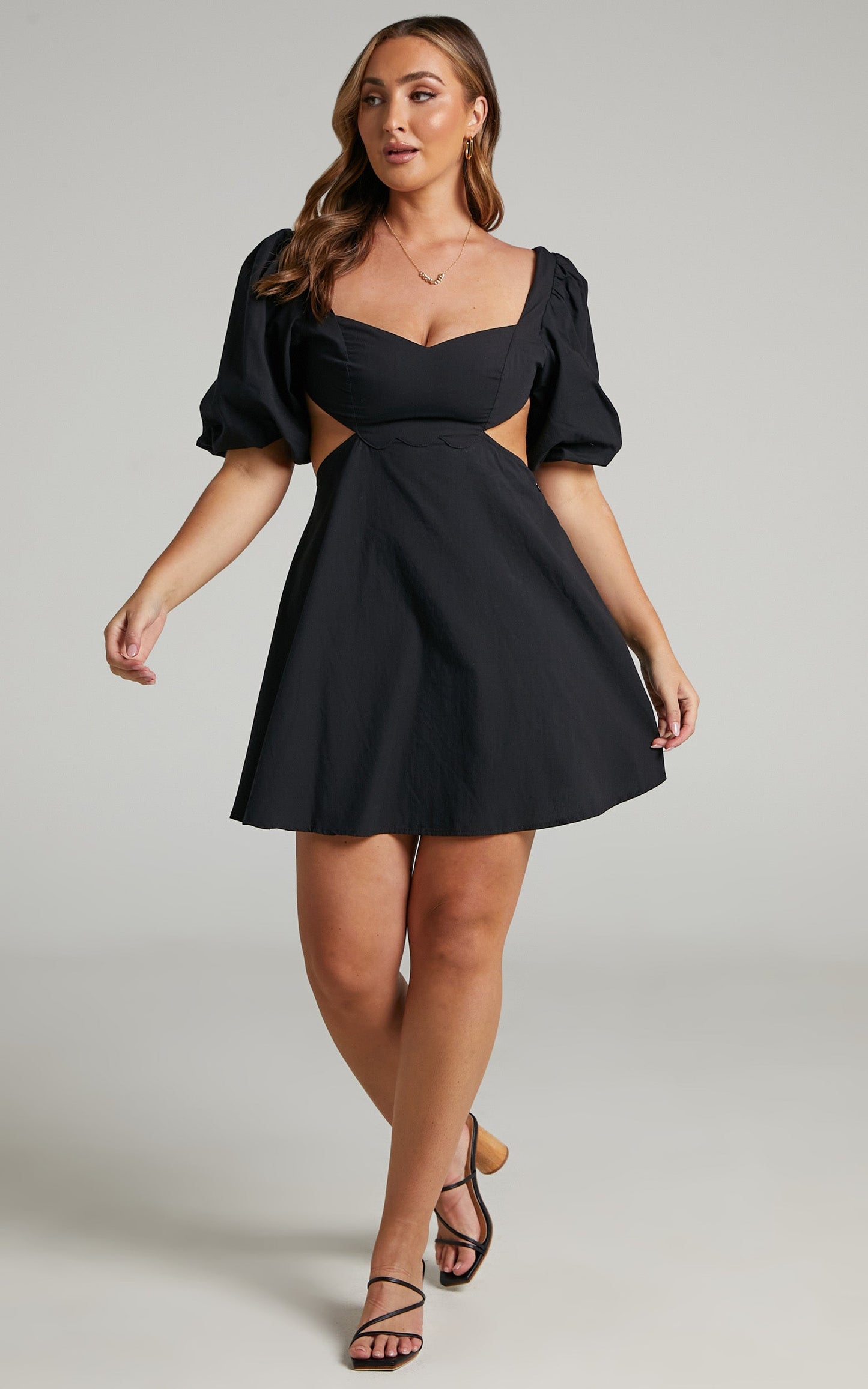 Jordonia Oversized Balloon Sleeve Open Back Mini Dress in Black