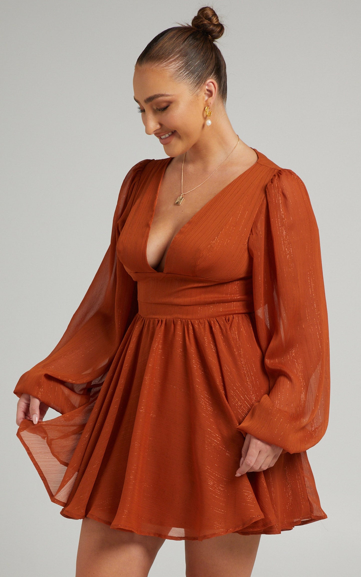 Camari Balloon Sleeve Open Back Mini dress in Rust