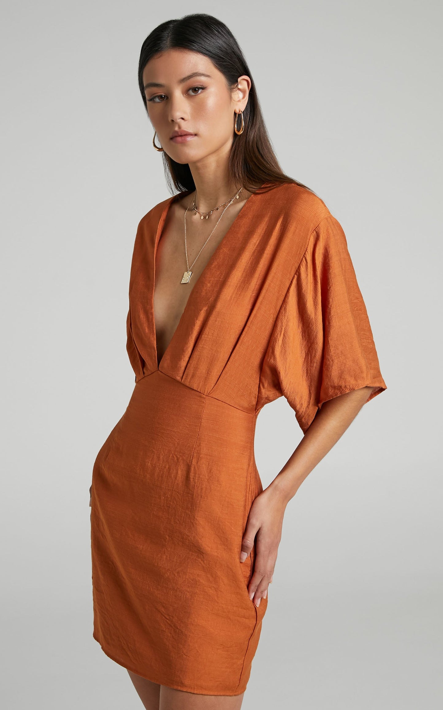 Avella Plunge Neck Angel Sleeve Mini Dress in Biscuit