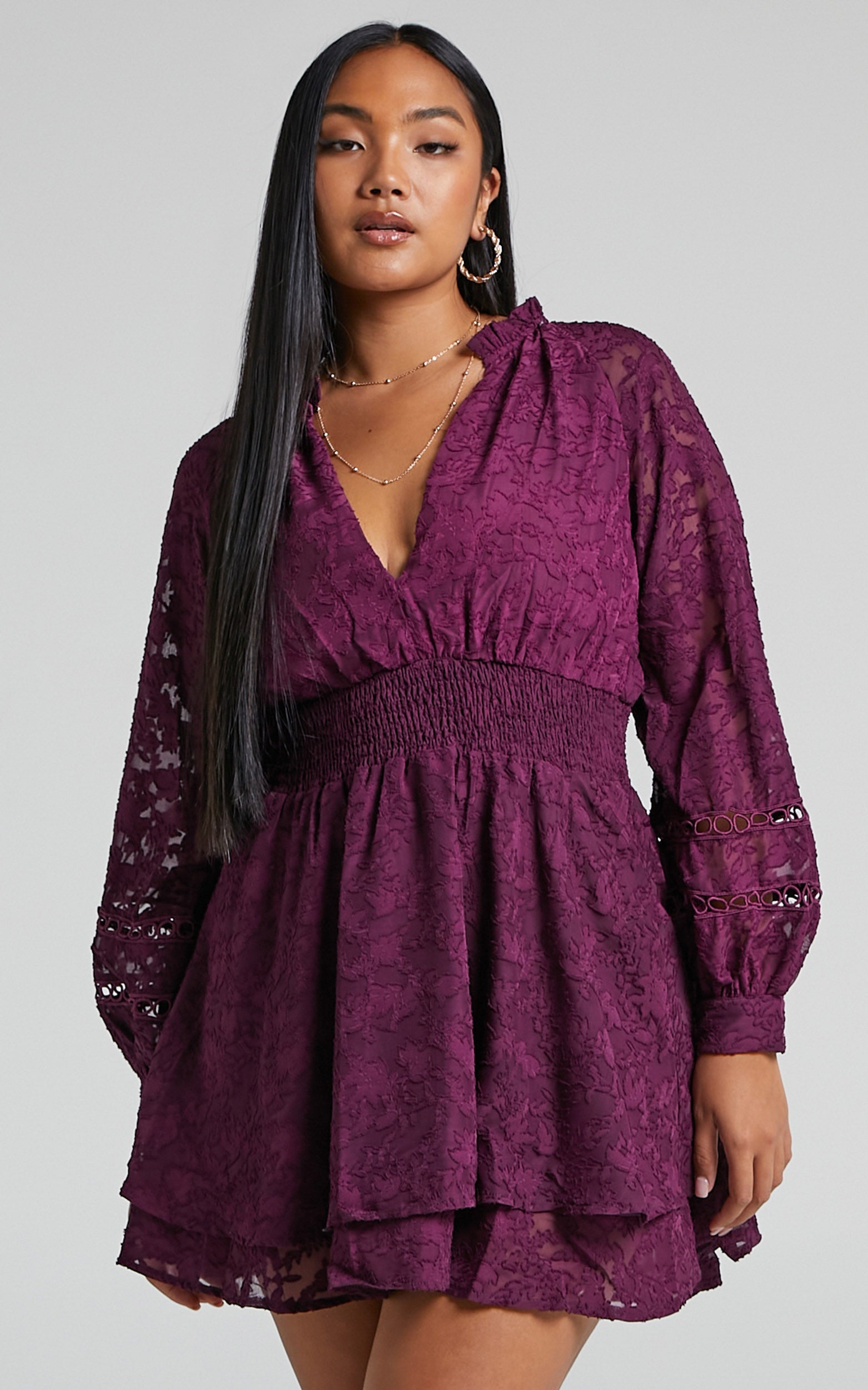 Millahna Long Sleeve Circle Trim Tiered Mini Dress in Plum