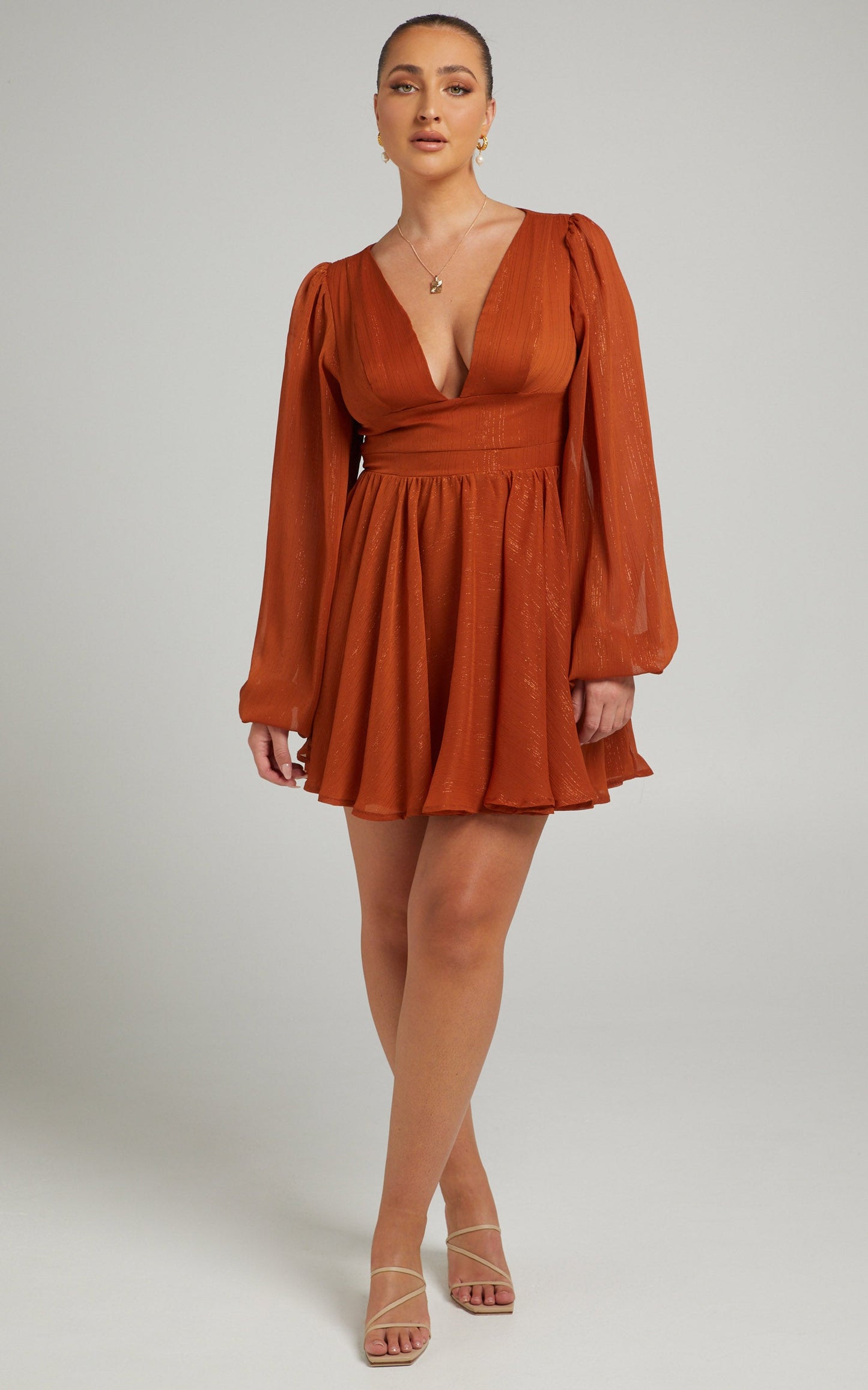 Camari Balloon Sleeve Open Back Mini dress in Rust