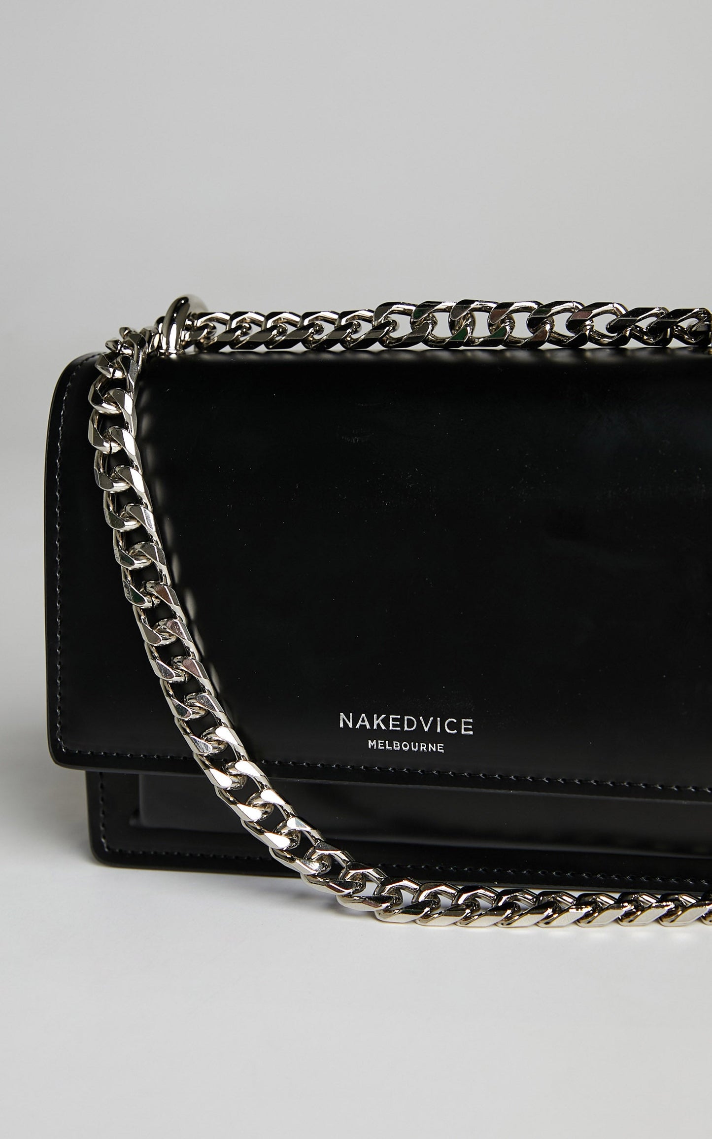 NAKEDVICE - THE REGIS BAG in Black/Silver