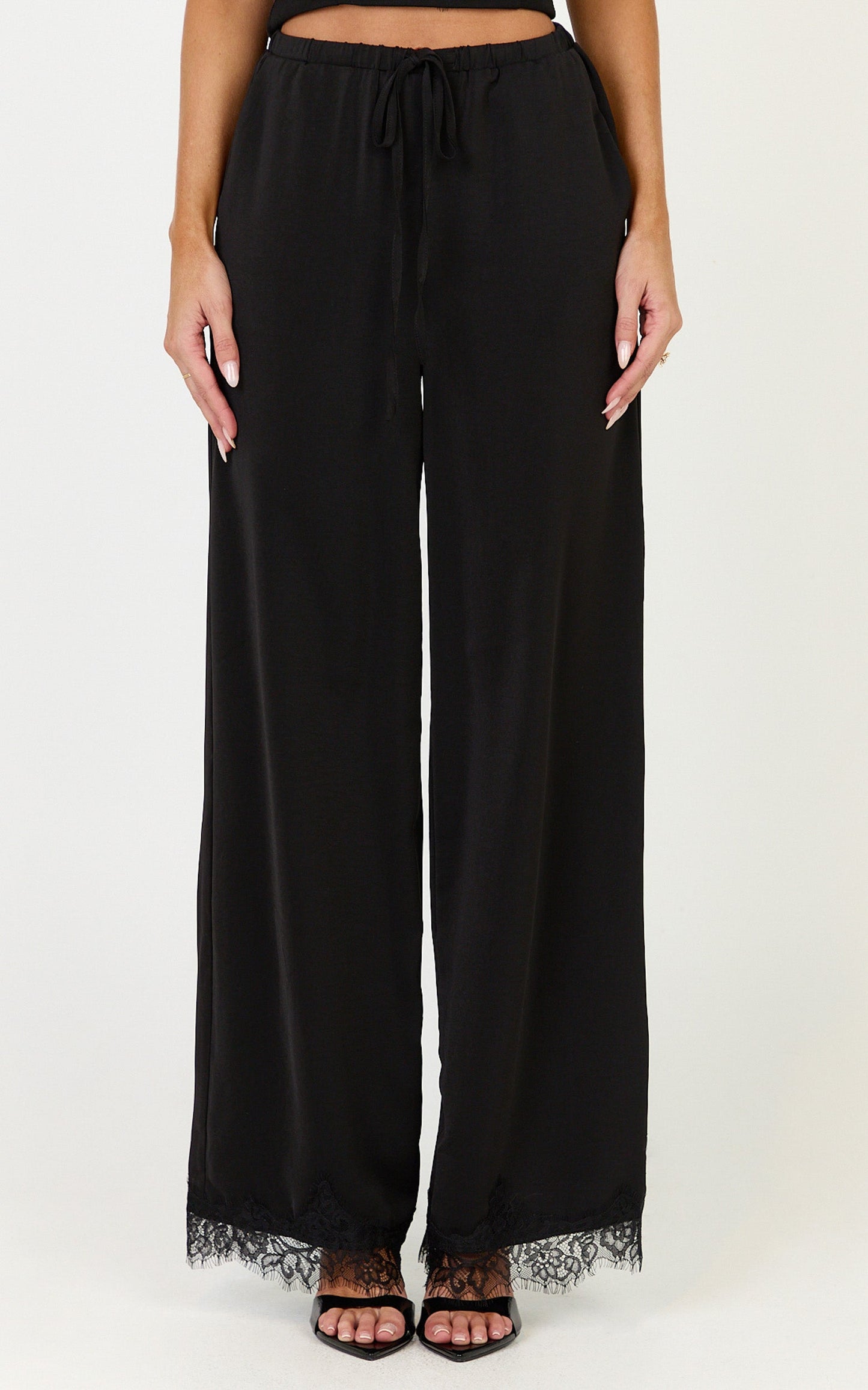 Ava Pants - Mid Waist Relaxed Leg Lace Hem Pants in Black