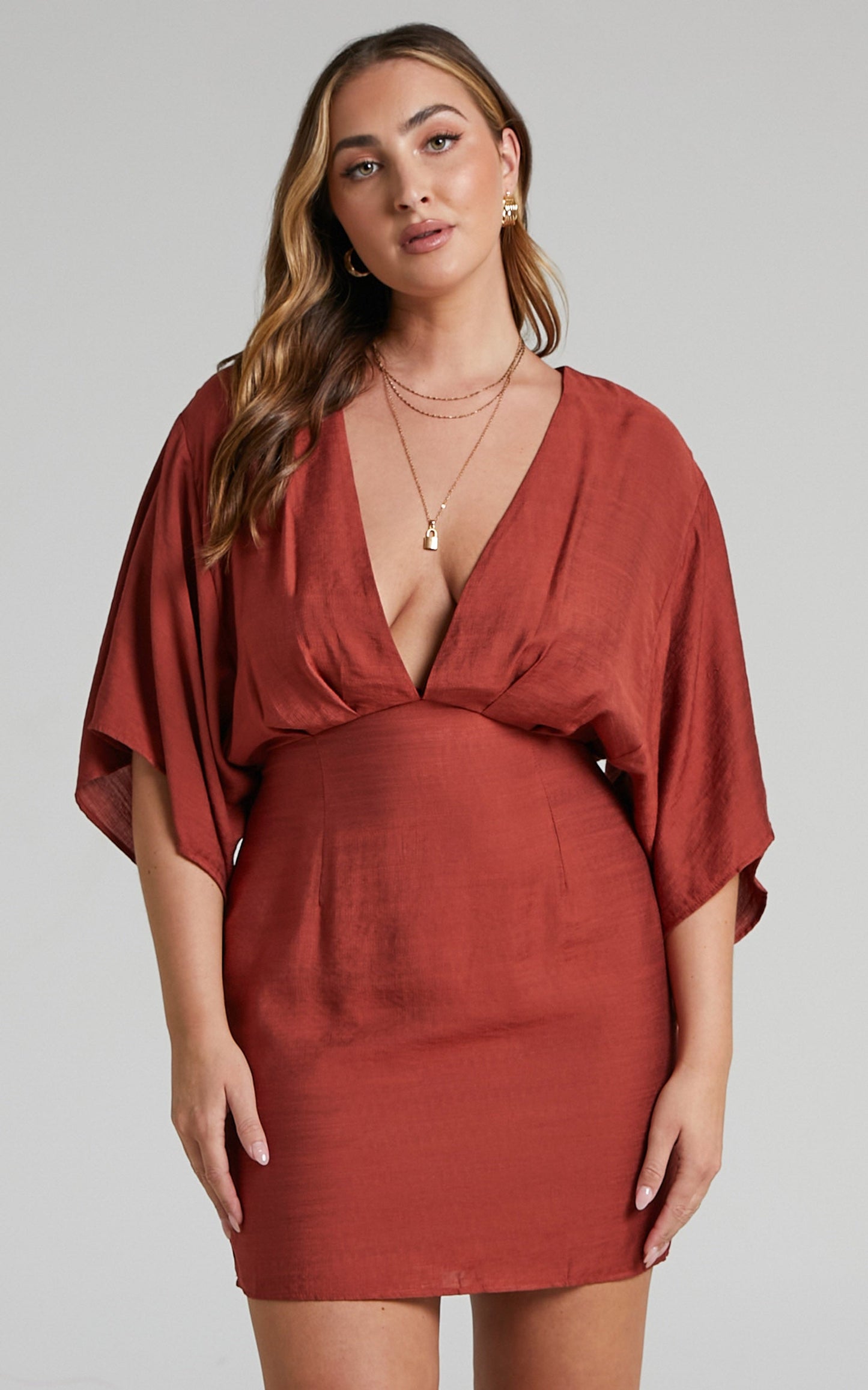 Avella Plunge Neck Angel Sleeve Mini Dress in Rust