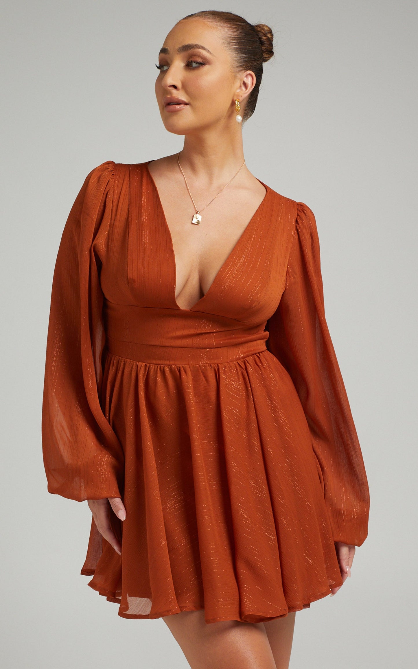 Camari Balloon Sleeve Open Back Mini dress in Rust