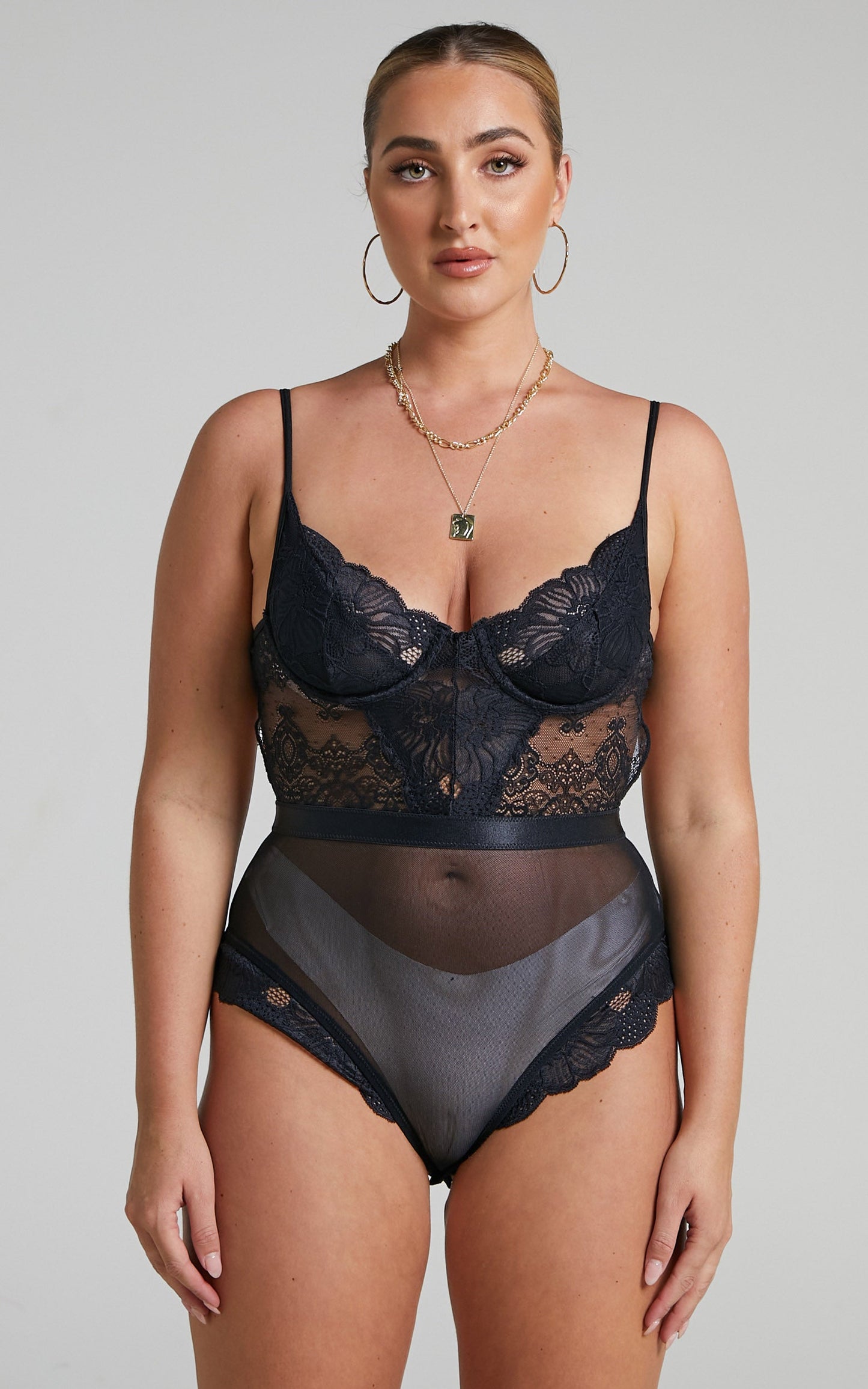 Tharamay Strappy Open Back Lace Bodysuit in Black