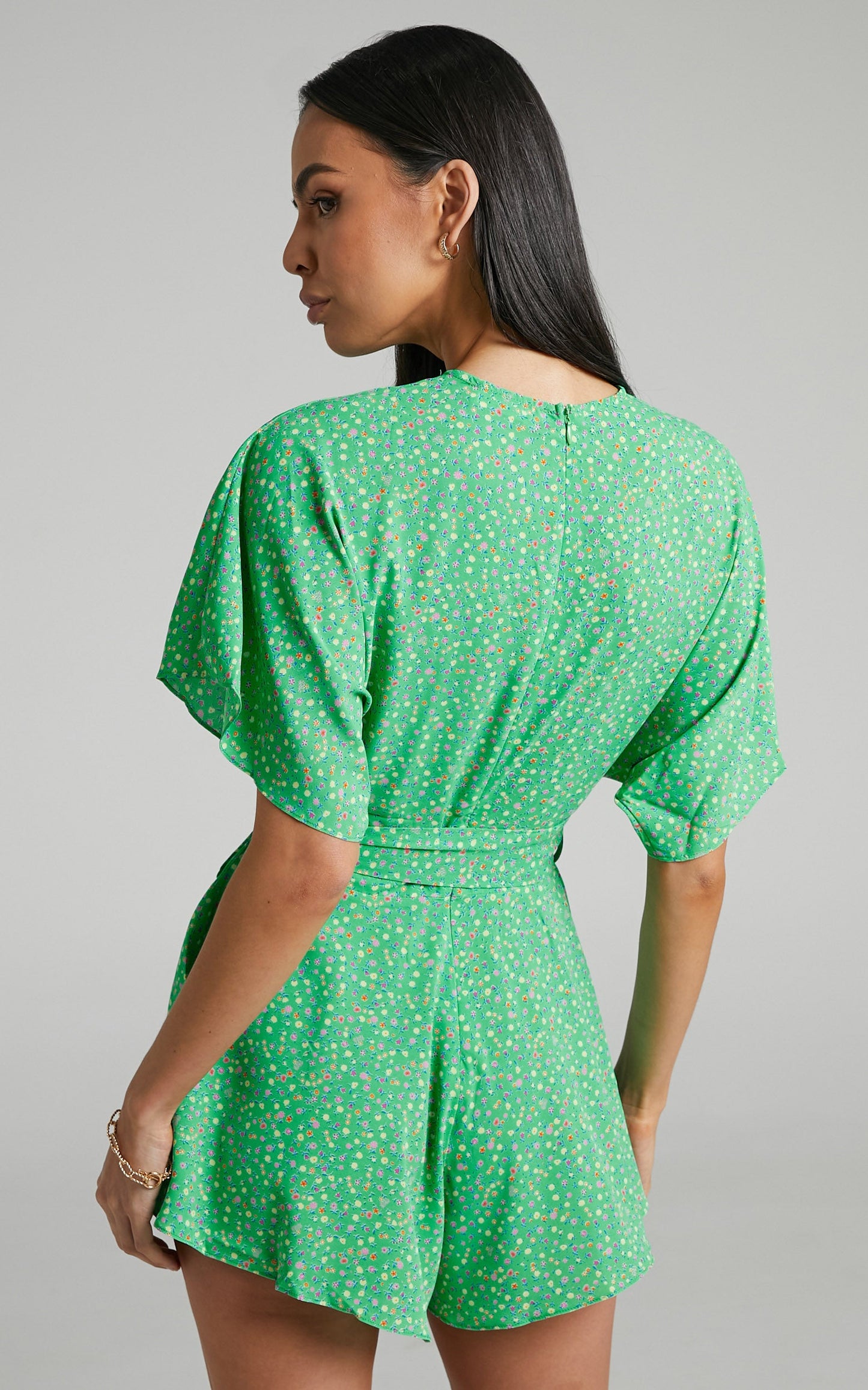 Feliza Playsuit - V Neck Flutter Sleeve Waist Tie Playsuit in Green Floral