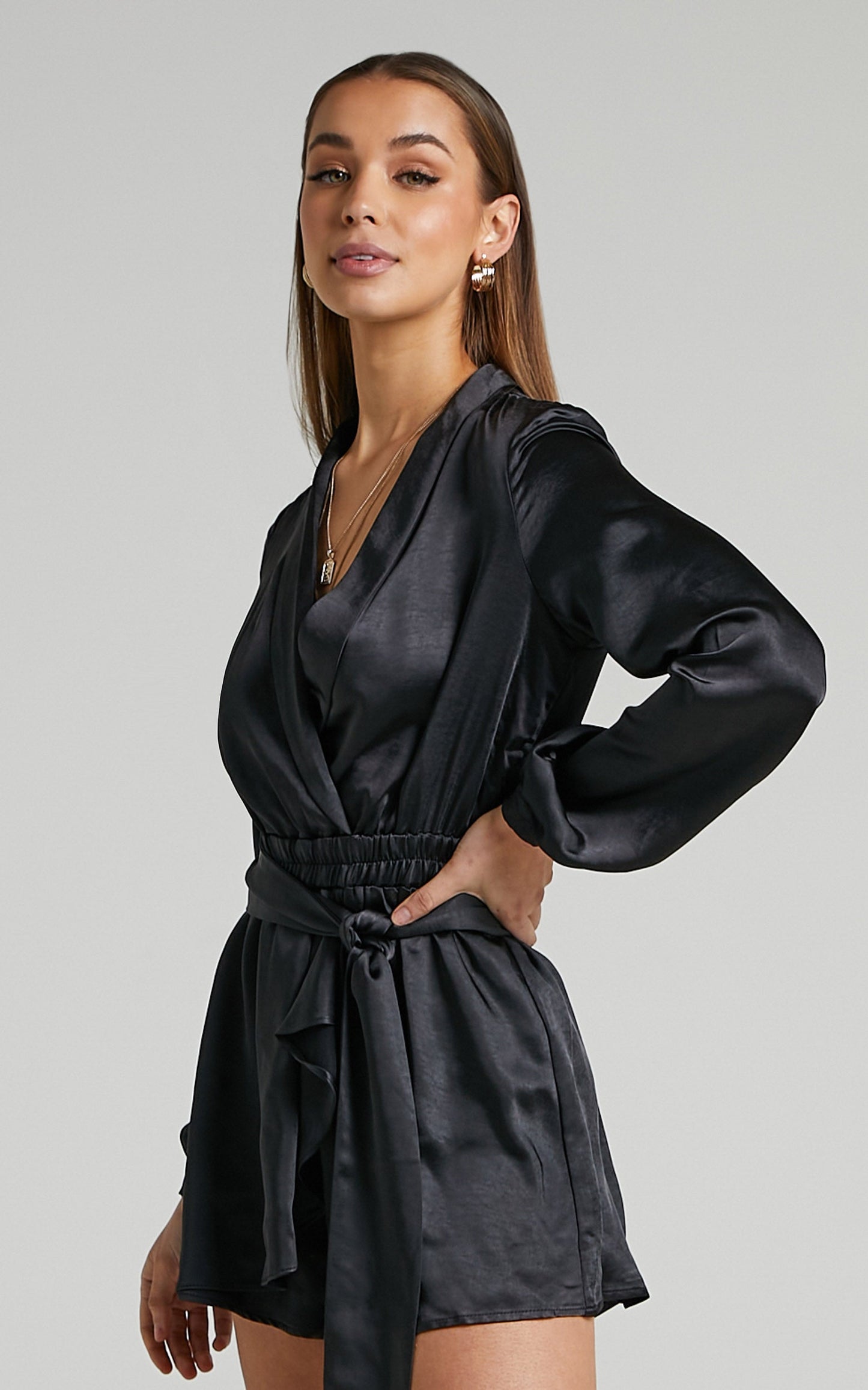 Leo Long Sleeve Wrap Neckline Playsuit in Black Satin