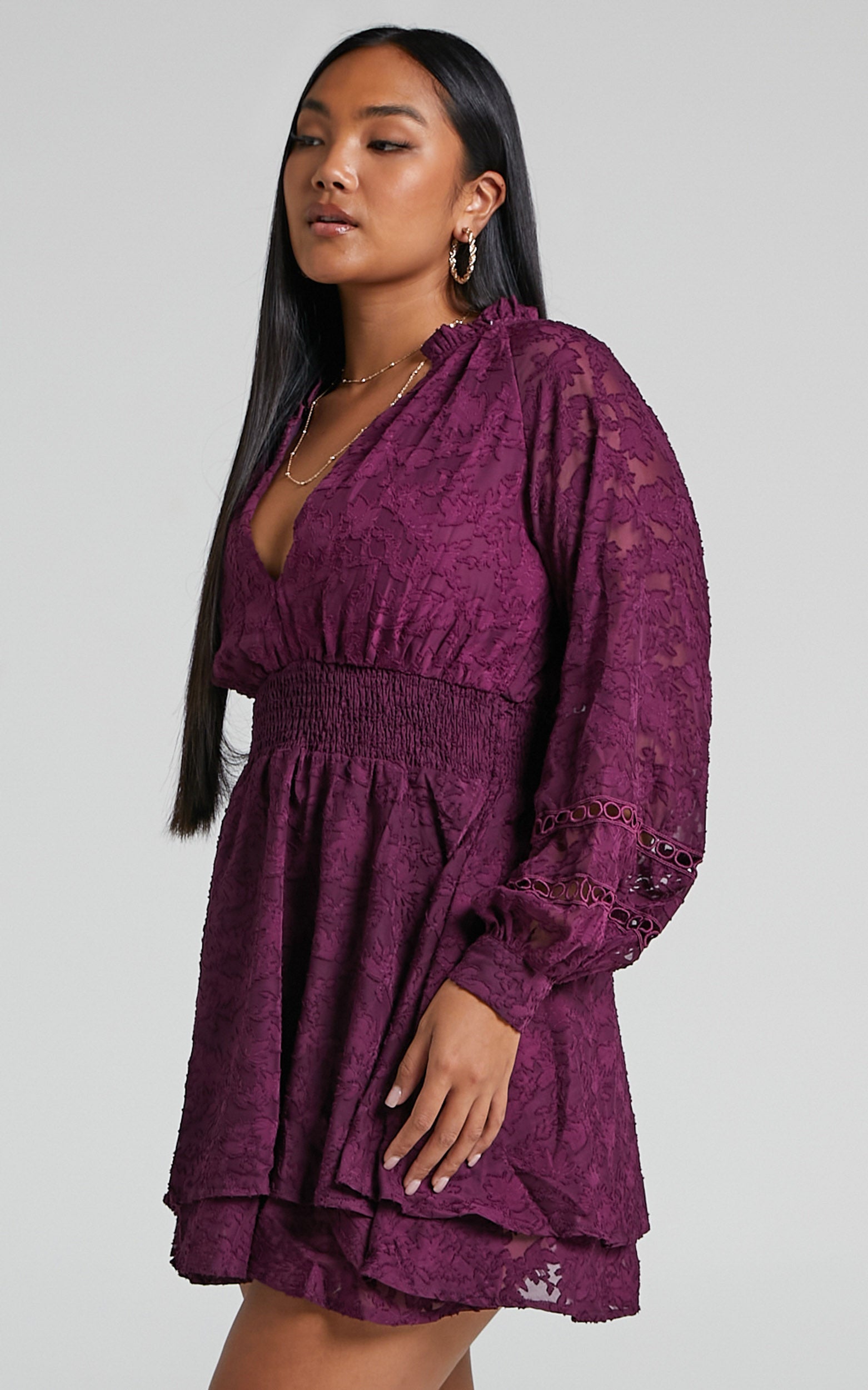 Millahna Long Sleeve Circle Trim Tiered Mini Dress in Plum