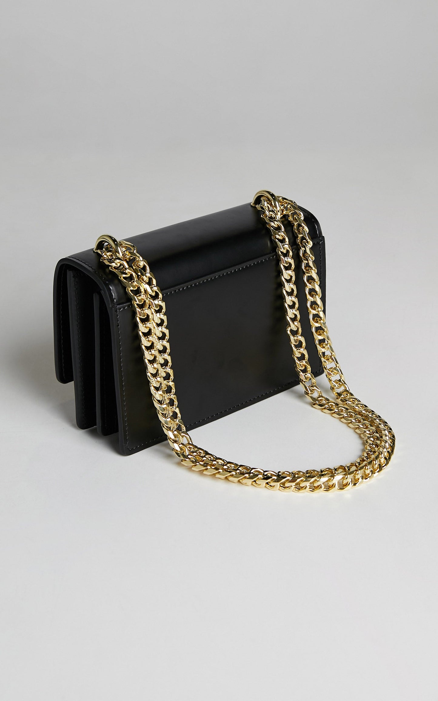 NAKEDVICE - THE REGIS BAG in Black/gold