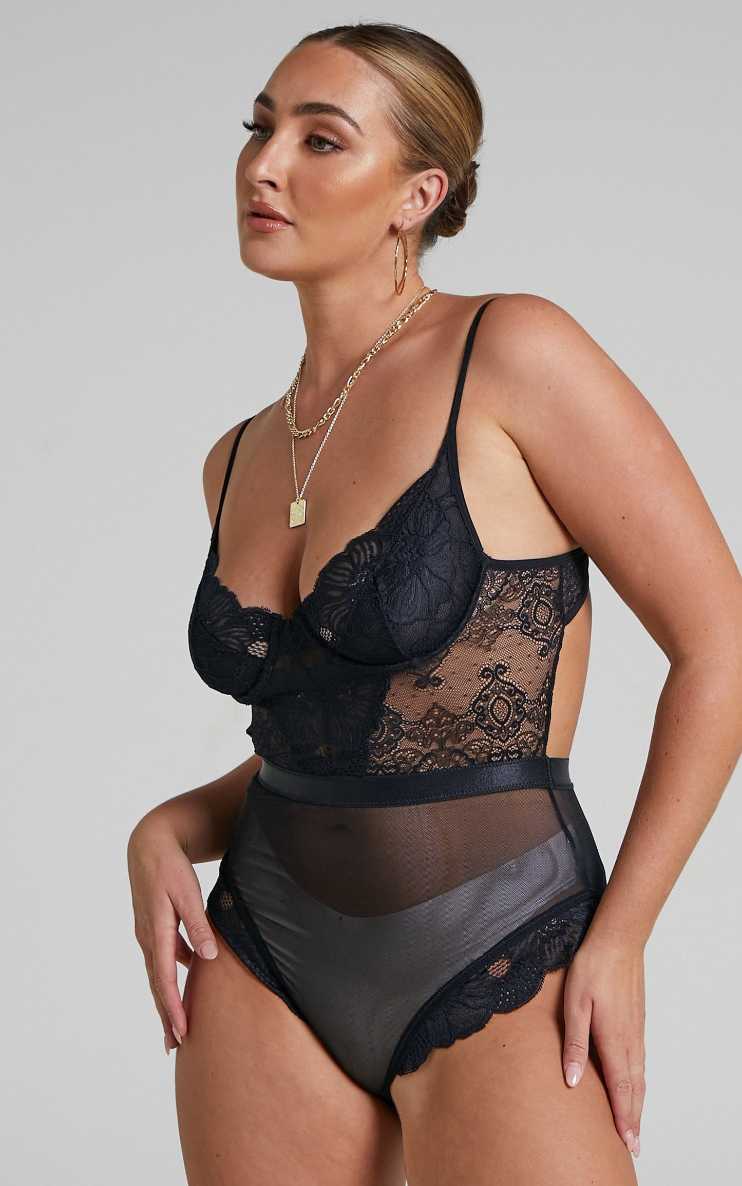 Tharamay Strappy Open Back Lace Bodysuit in Black