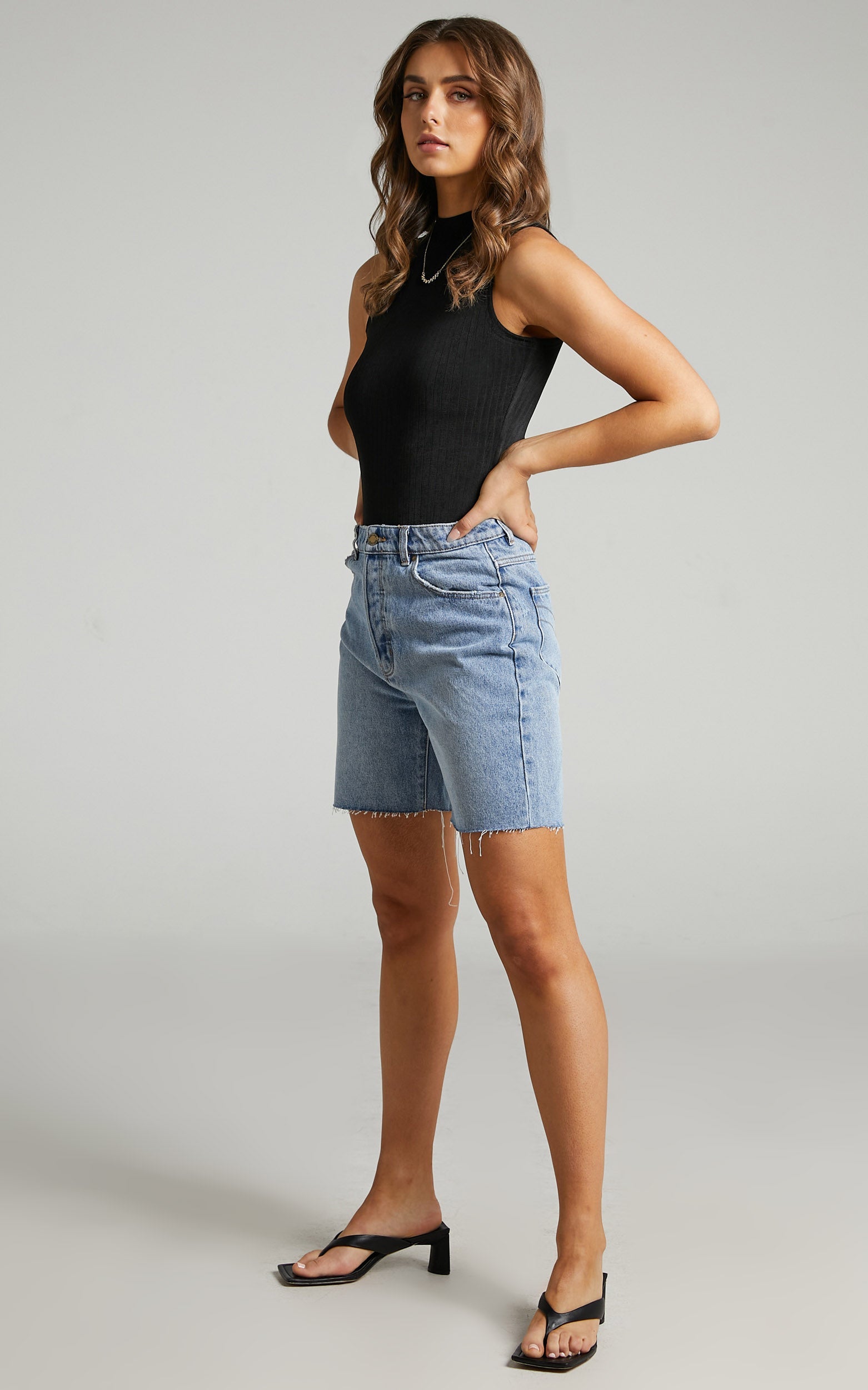 Constance Bodysuit - High Neck Ribbed Bodysuit in Black
