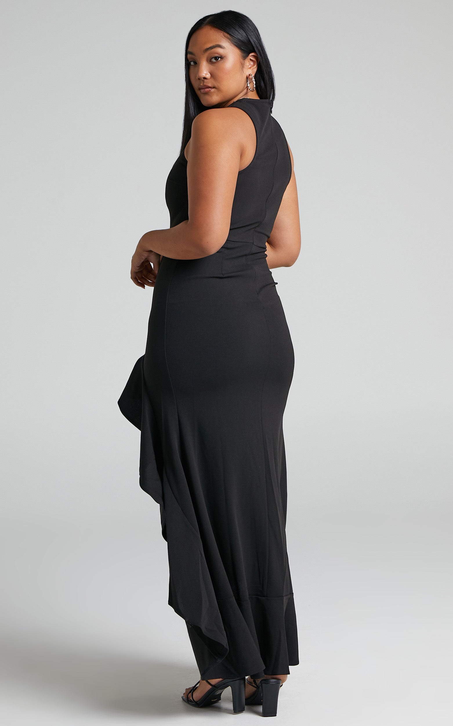 Erytheia Asymmetrical Ruffle Hem Maxi Dress in Black
