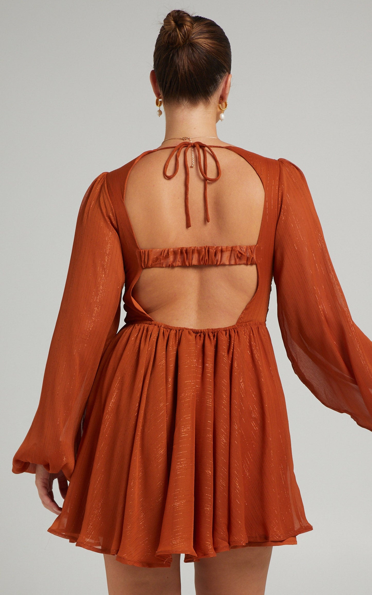 Camari Balloon Sleeve Open Back Mini dress in Rust