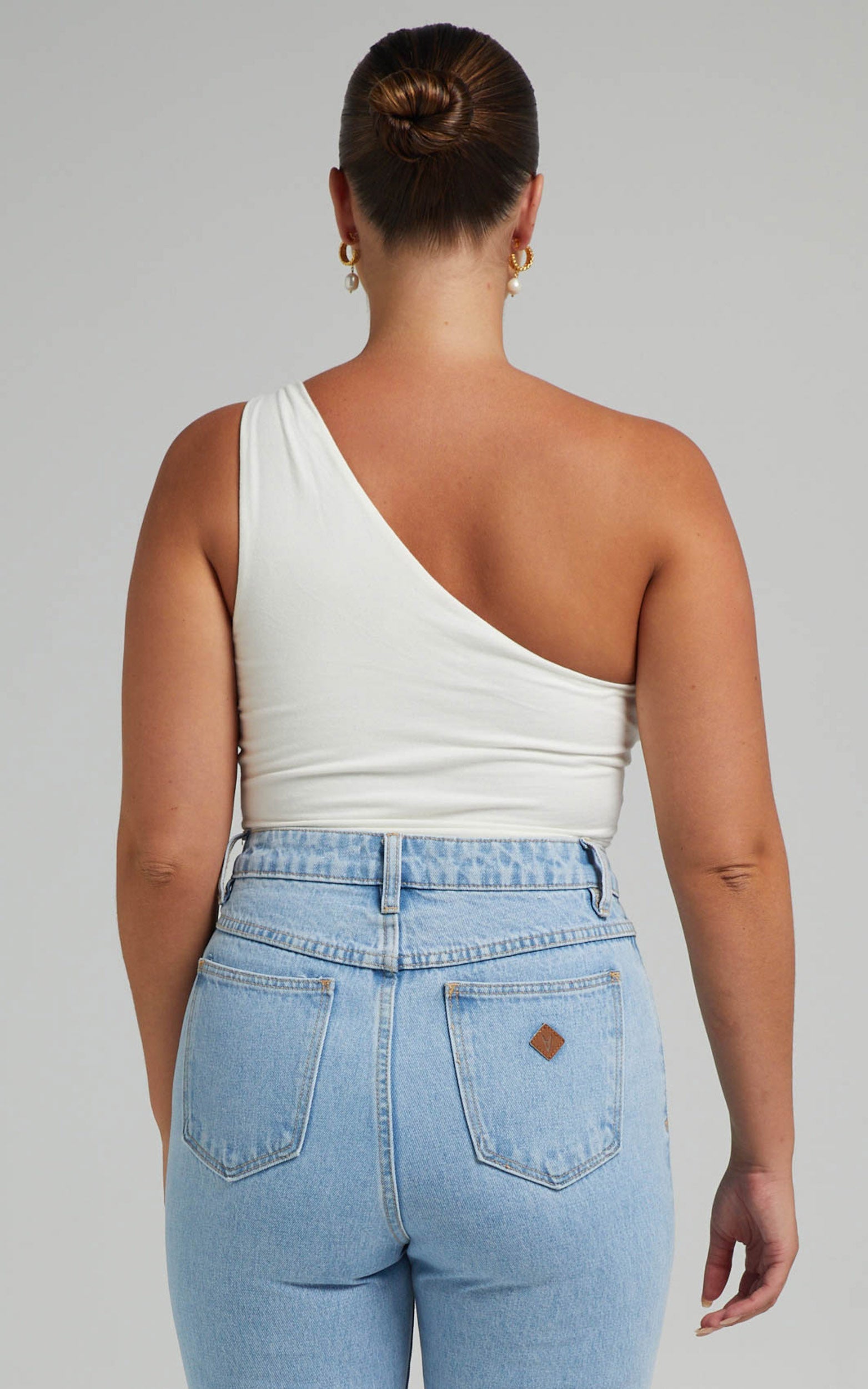 Shivya One Shoulder Cut Out Body Suit in White