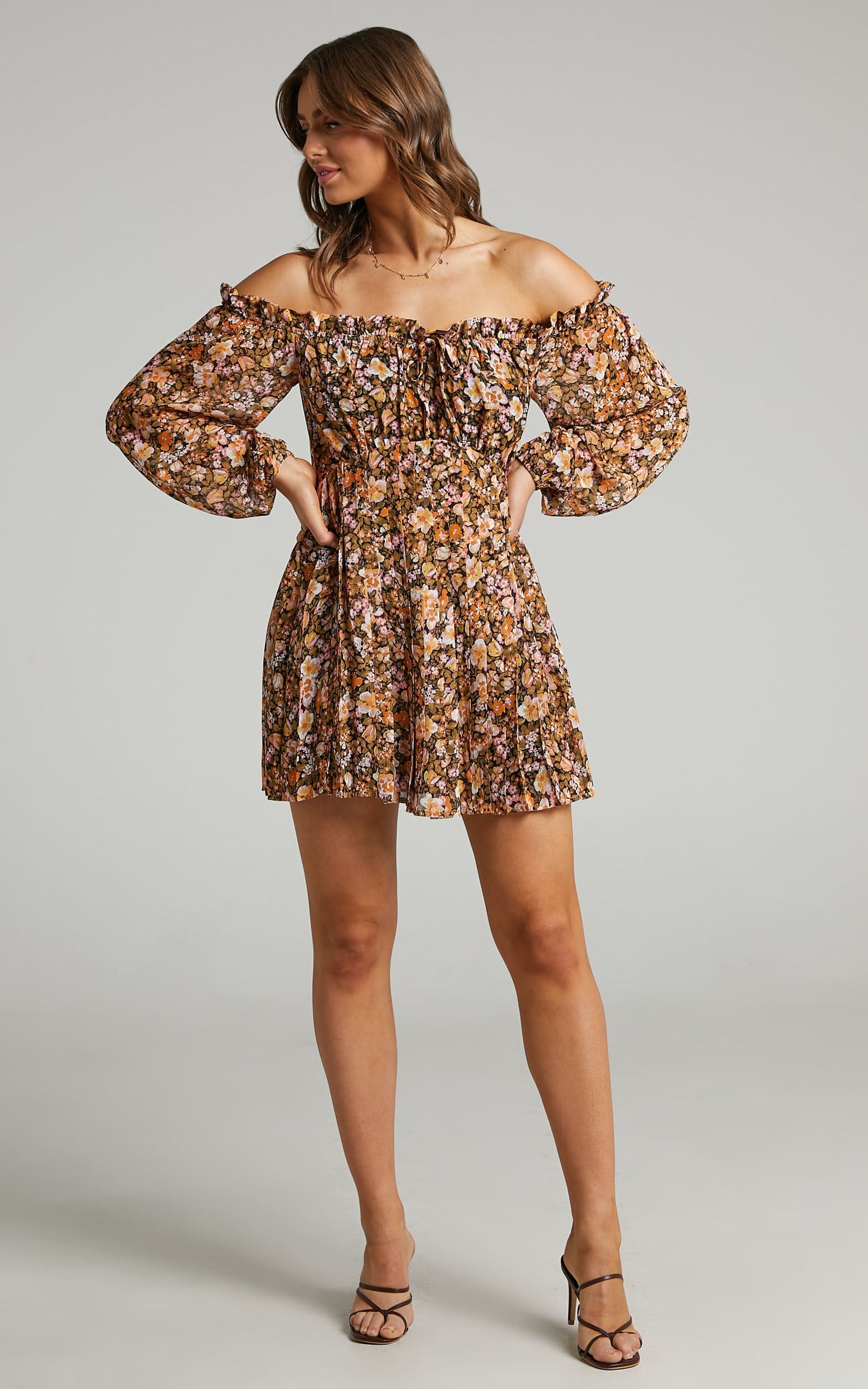 Aeryn Off Shoulder Pleated Mini Dress in Black Floral