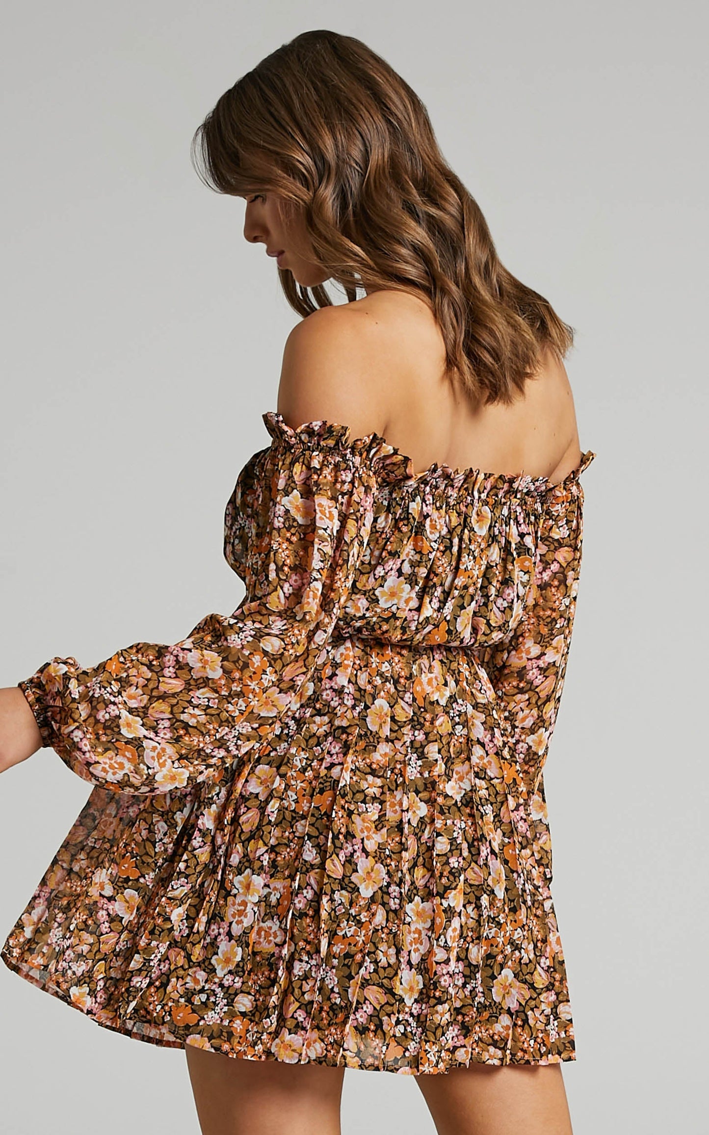 Aeryn Off Shoulder Pleated Mini Dress in Black Floral