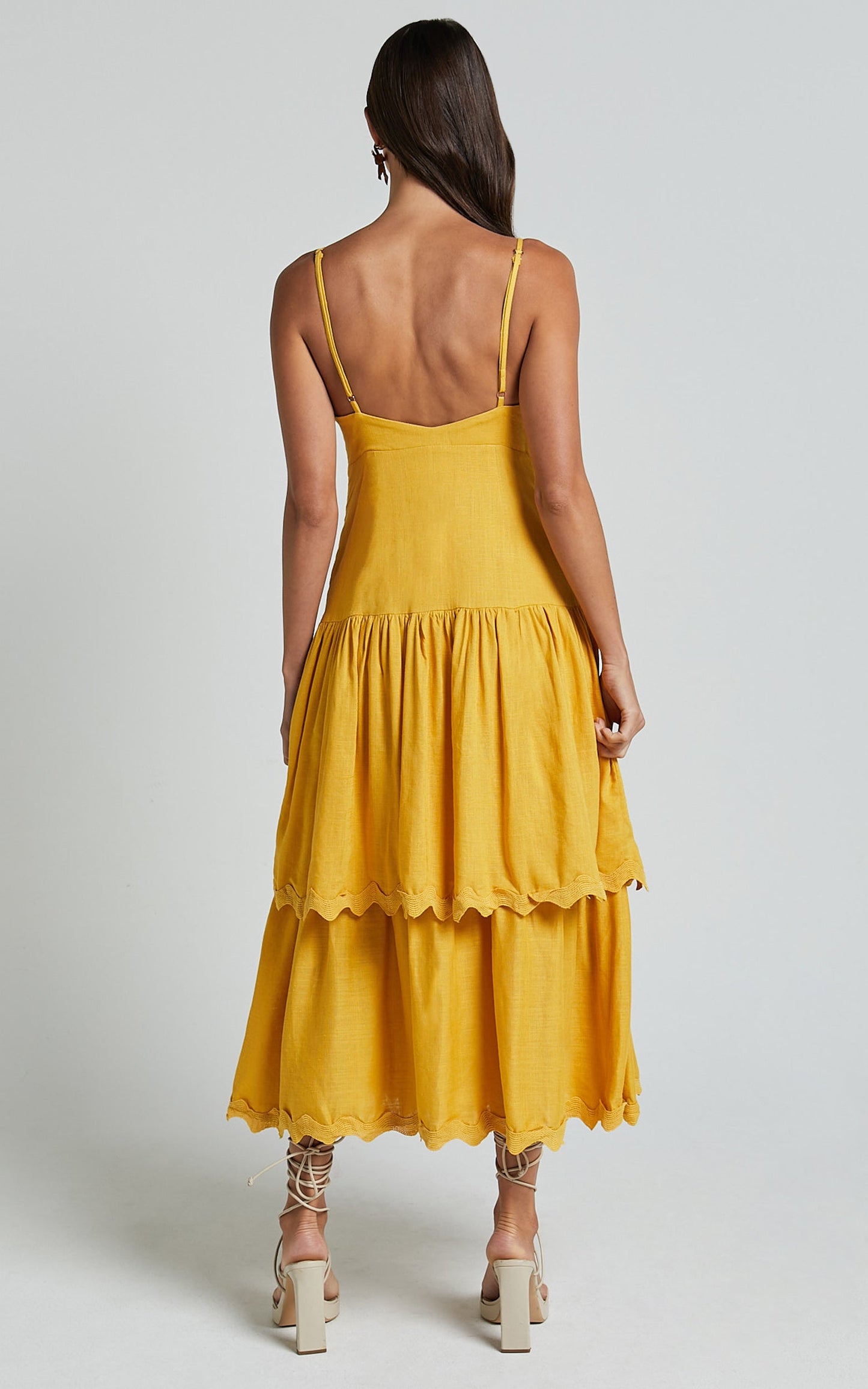 Amalie The Label - Cameo Linen Blend Low Back Tiered Midi Dress in Warm Yellow Gold