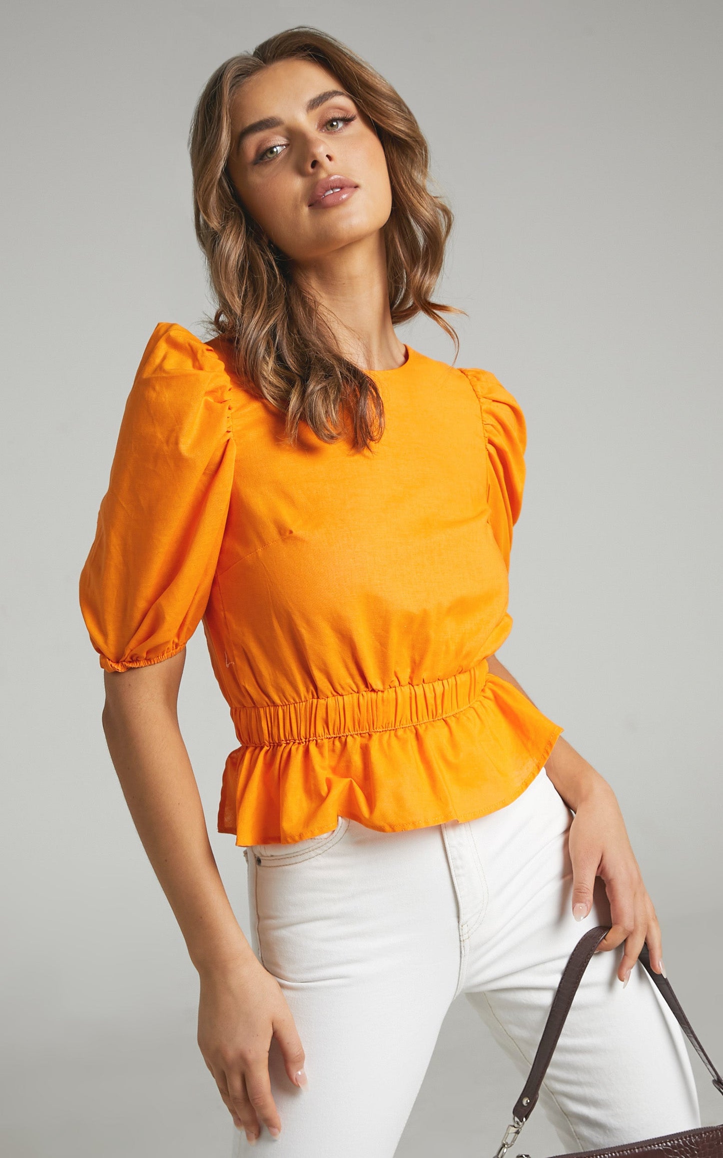 Bambina Open Back Peplum Top in Orange