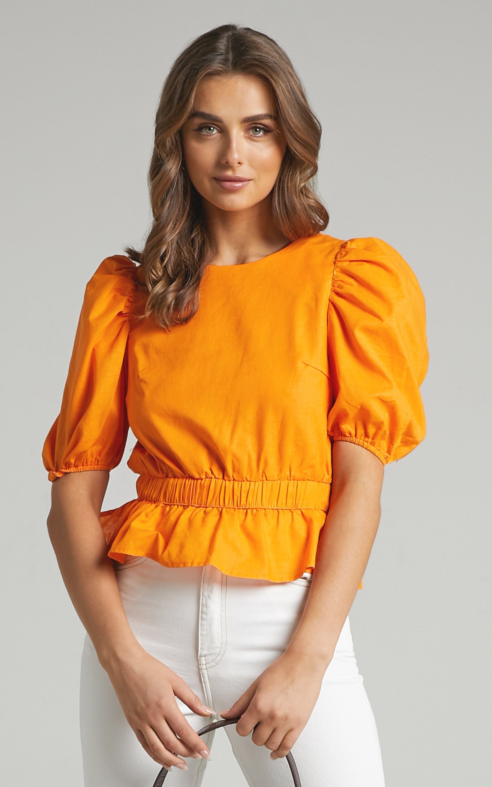 Bambina Open Back Peplum Top in Orange