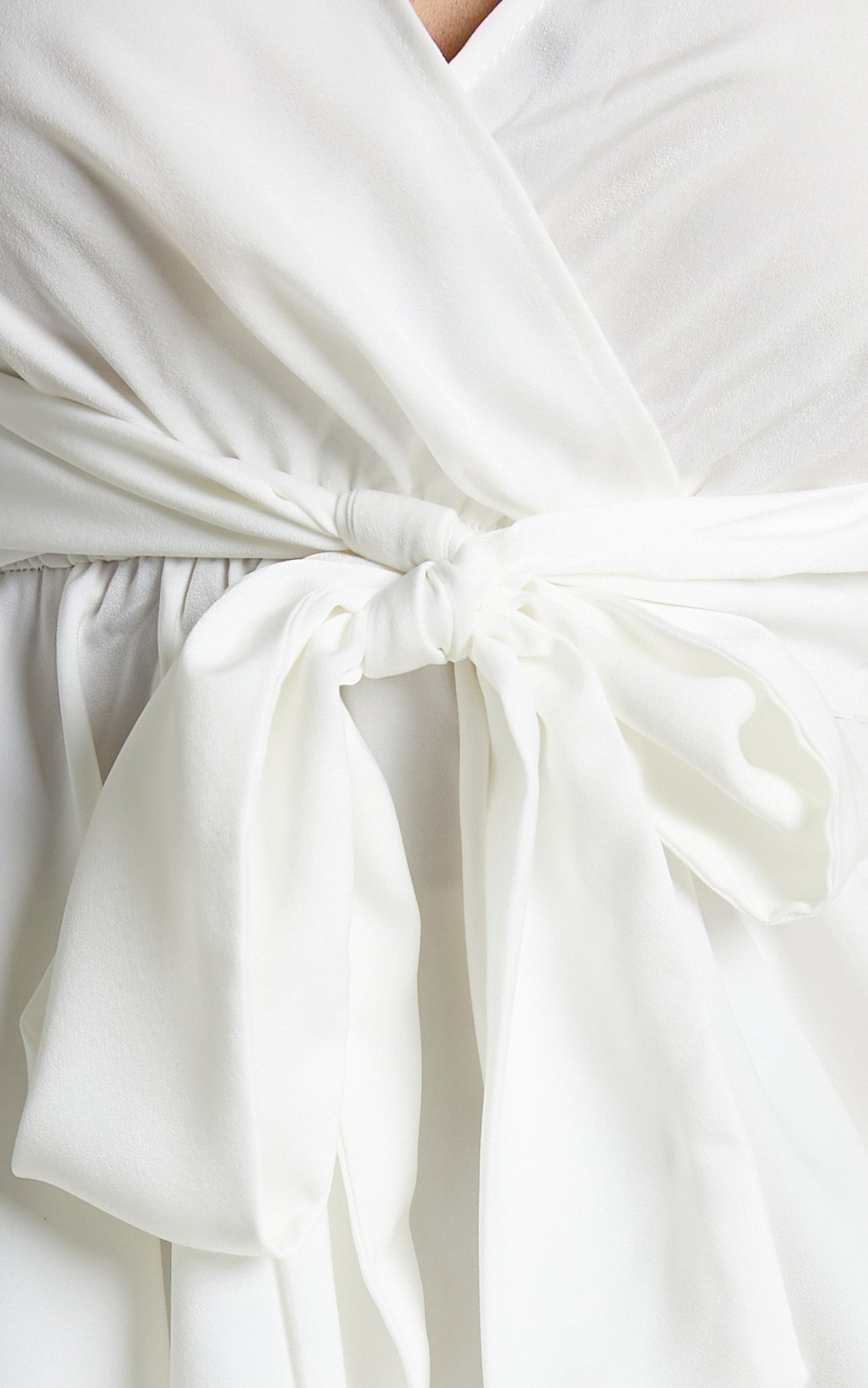 Betts Top - Puff Sleeve Asymmetric Tie Front Peplum Top in White