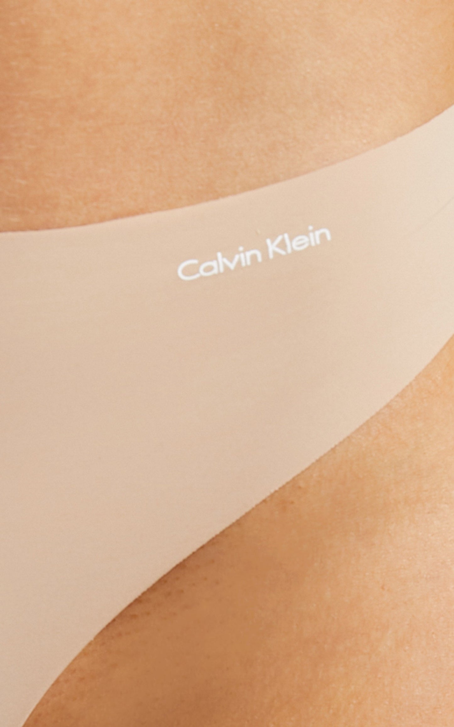 Calvin Klein - INVISIBLES THONG in Light Caramel