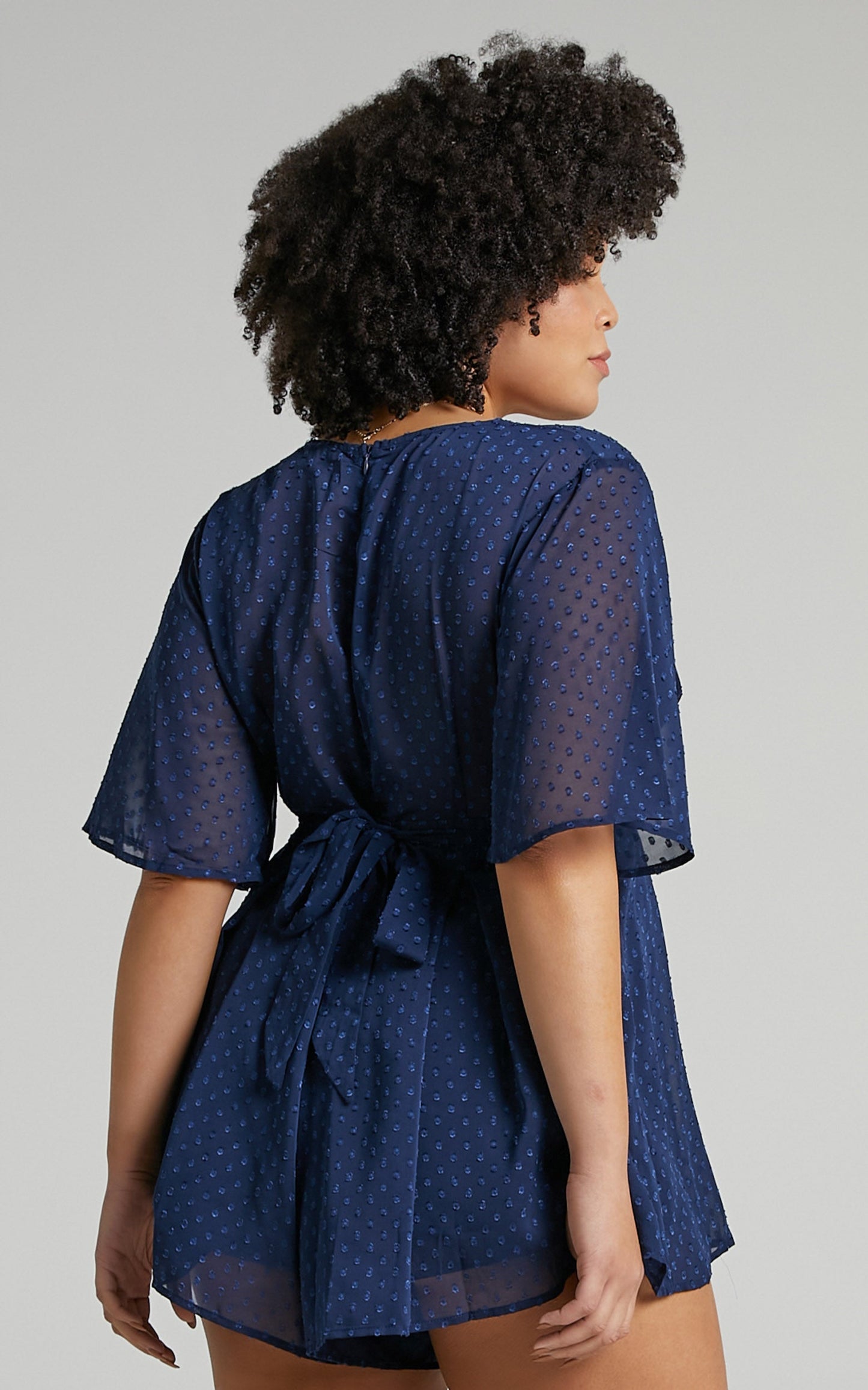 Chains Hit My Chest Plunge Mini Playsuit in Navy