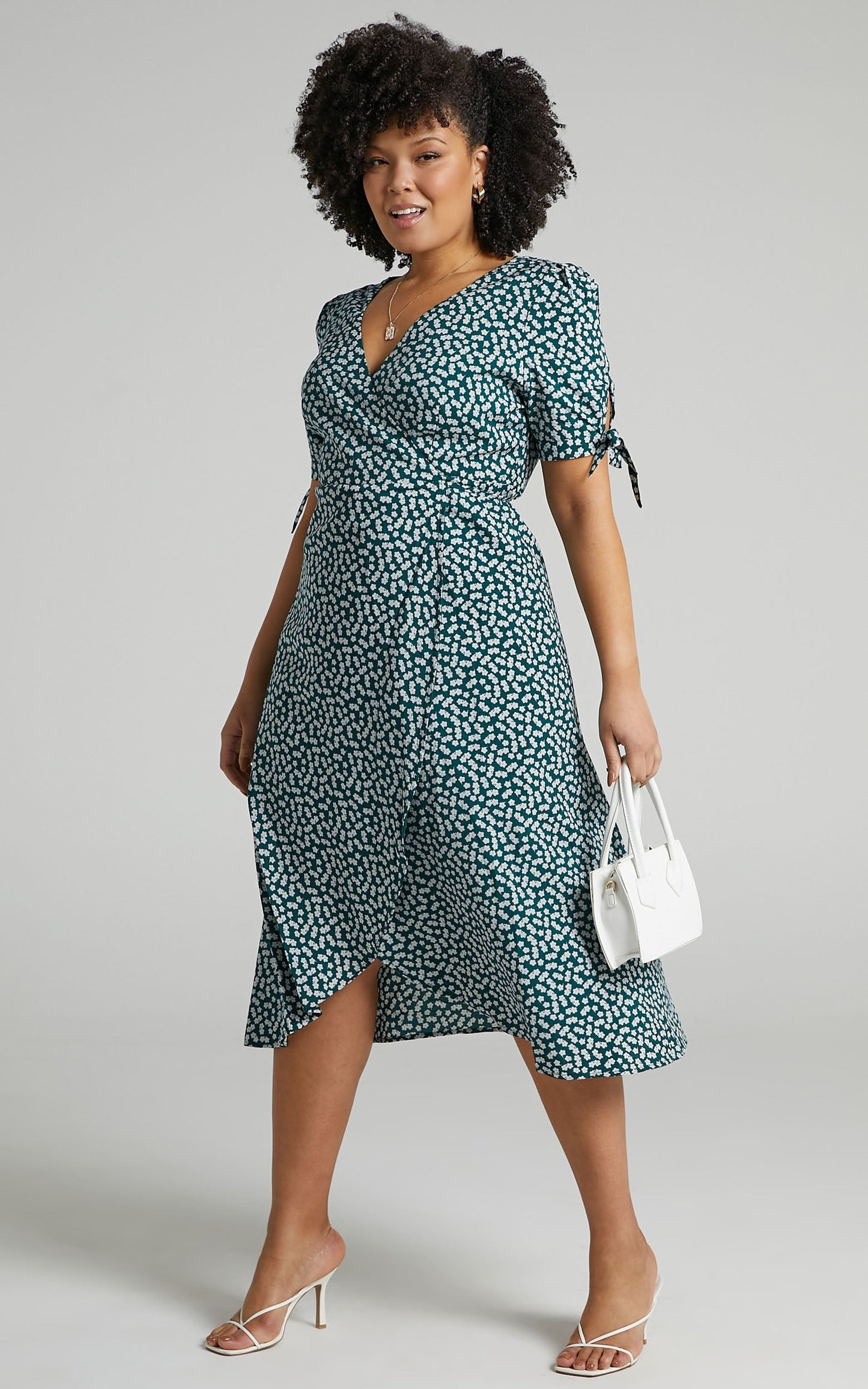 Dont Dream Its Over Wrap Midi Dress in Emerald Floral