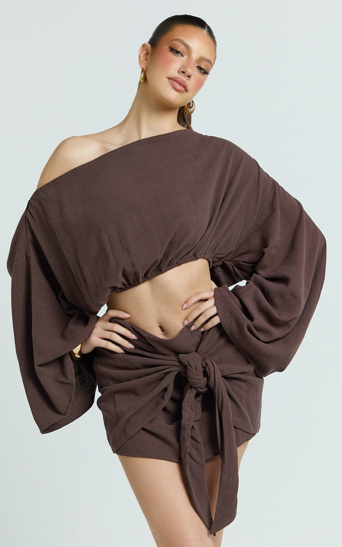 Elly Two Piece Top and Skirt Set - Asymmetric Boat Neck Elastic Hem Top and Tie Front Wrap Skirt Set in Chocolate