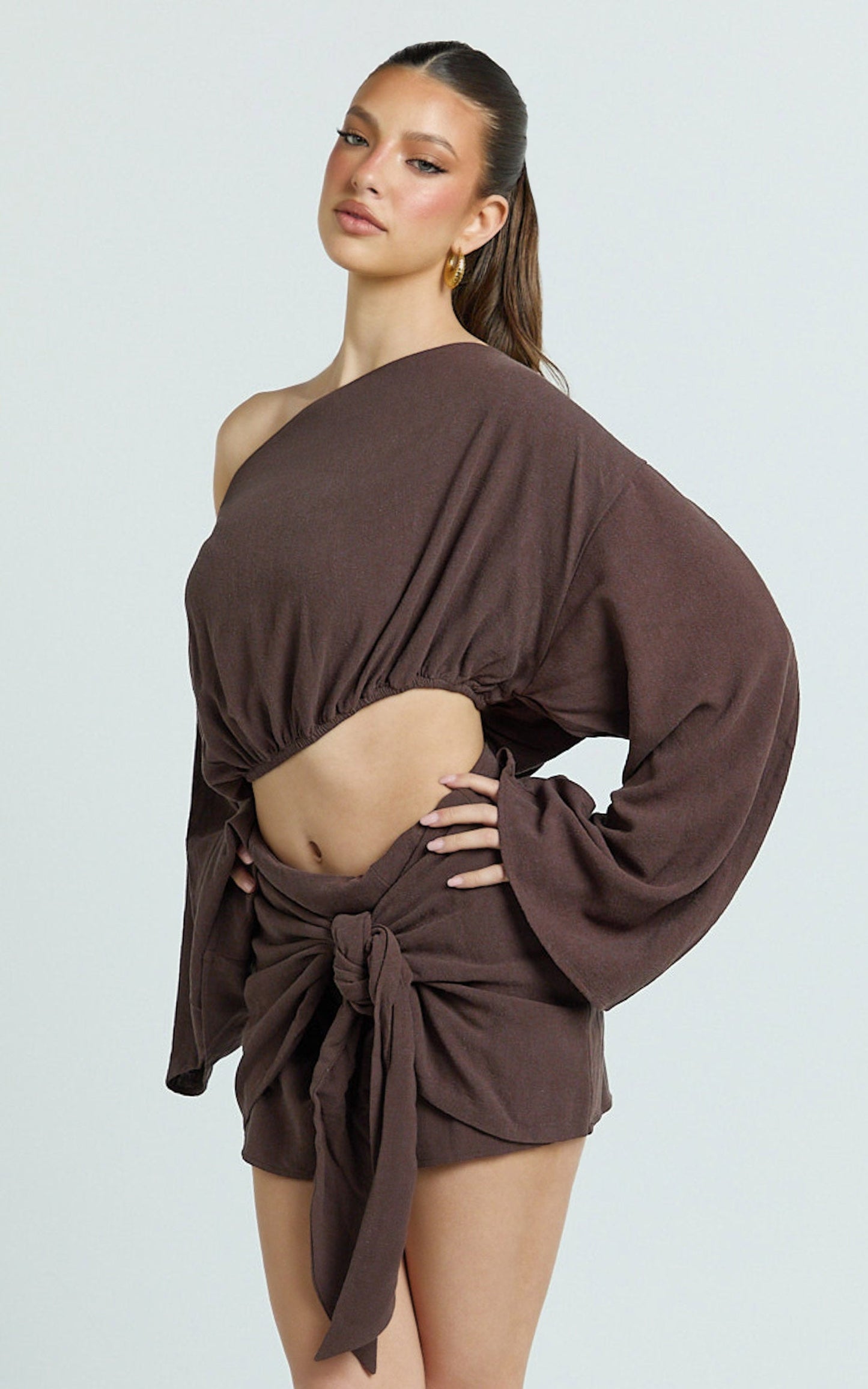 Elly Two Piece Top and Skirt Set - Asymmetric Boat Neck Elastic Hem Top and Tie Front Wrap Skirt Set in Chocolate