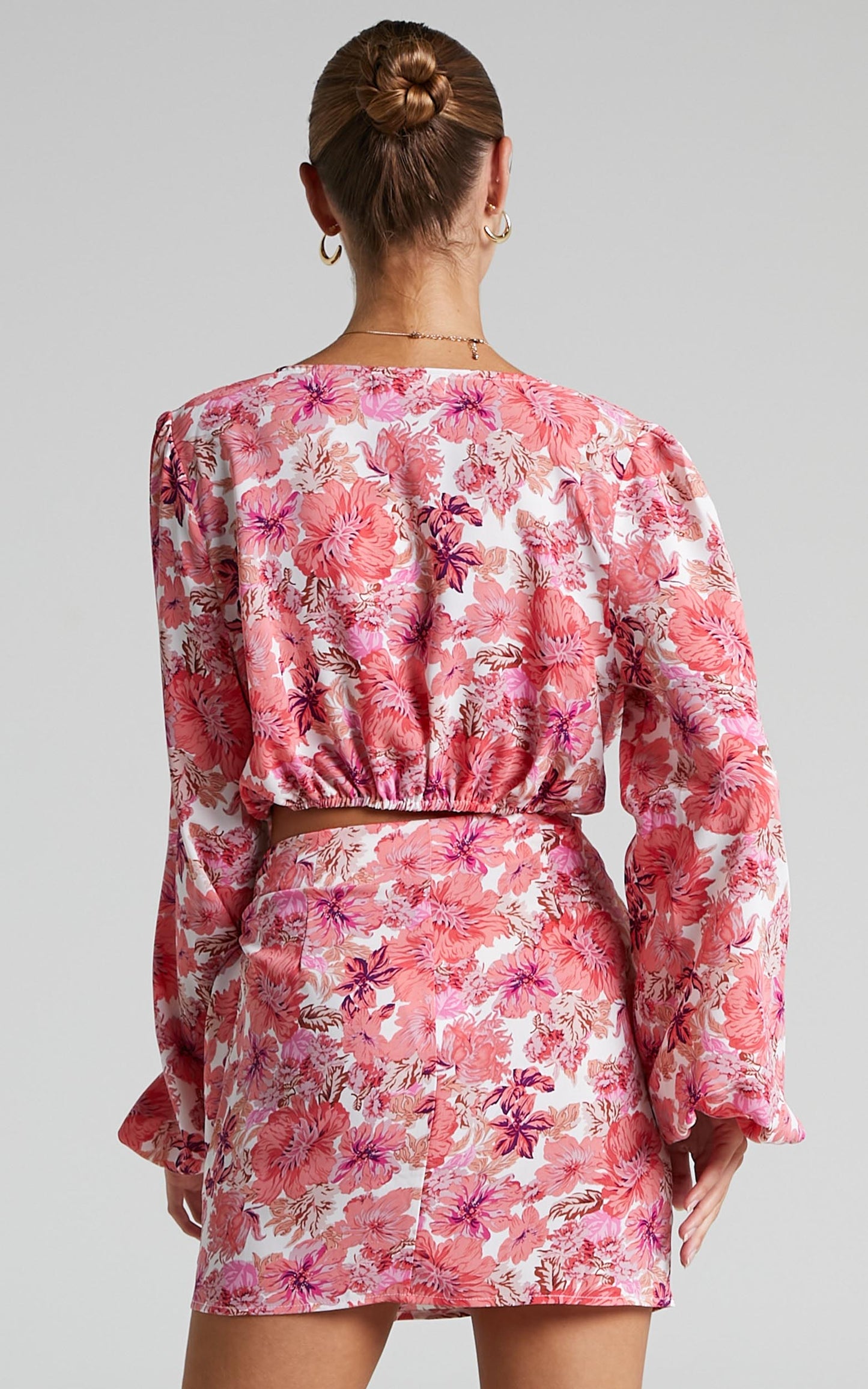 Geneve Wrap Side Tie Printed Mini Skirt in Pink Floral