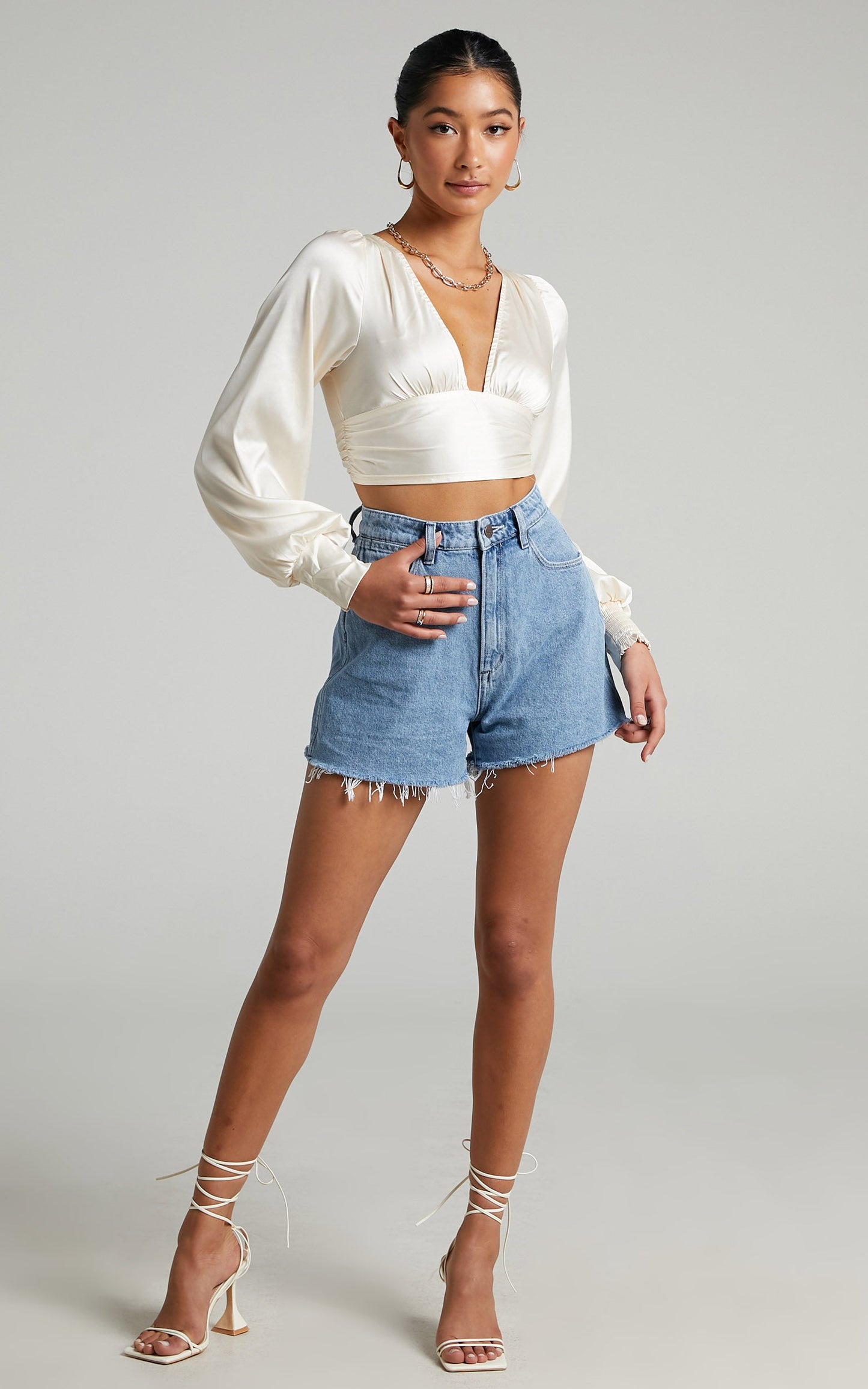 Gwennibeth Plunge Neck Tie Back Cropped Blouse in Champagne Satin