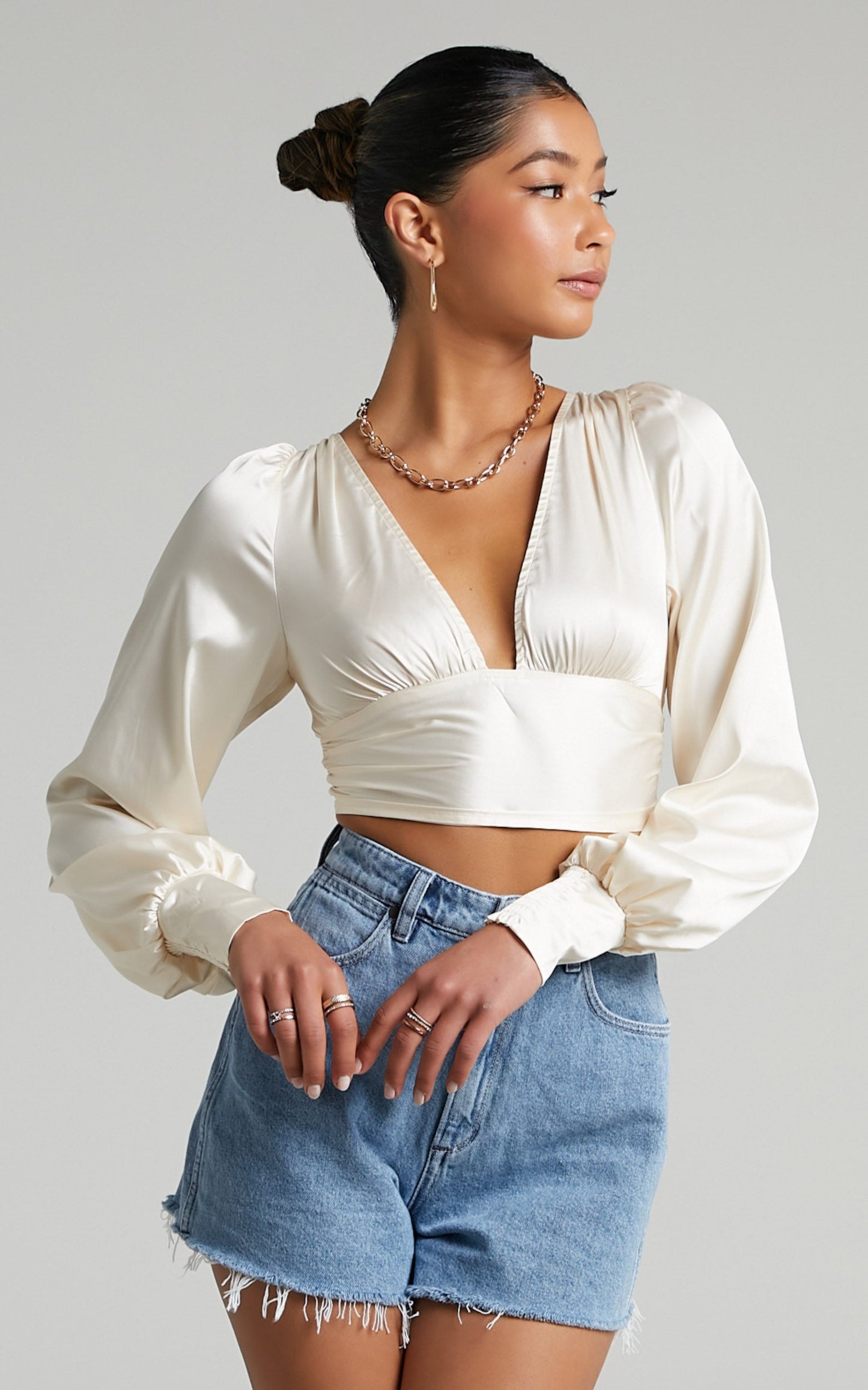 Gwennibeth Plunge Neck Tie Back Cropped Blouse in Champagne Satin
