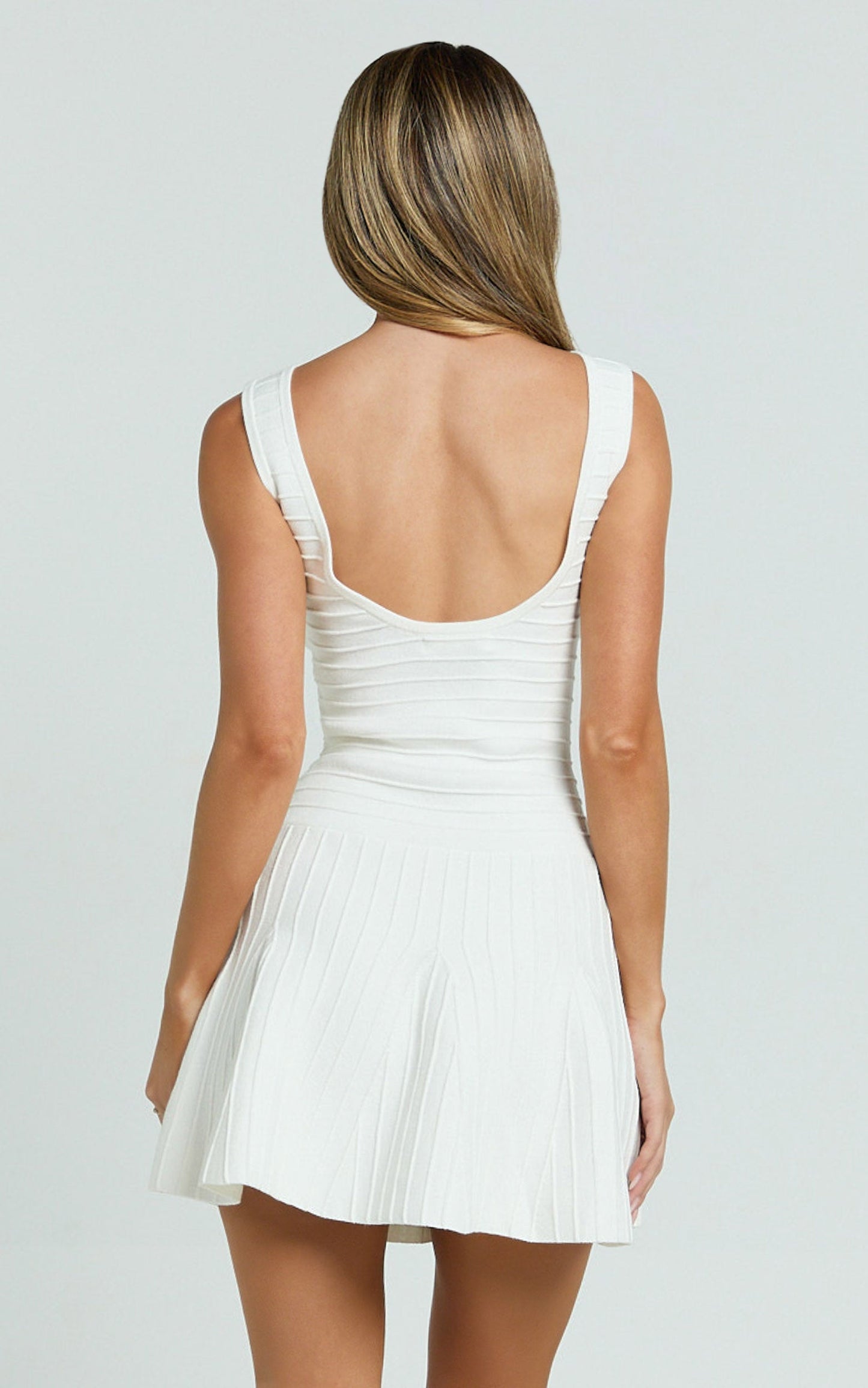 Jacqueline Mini Dress - High Neck Fit And Flare Pleat Knit Dress in Cream