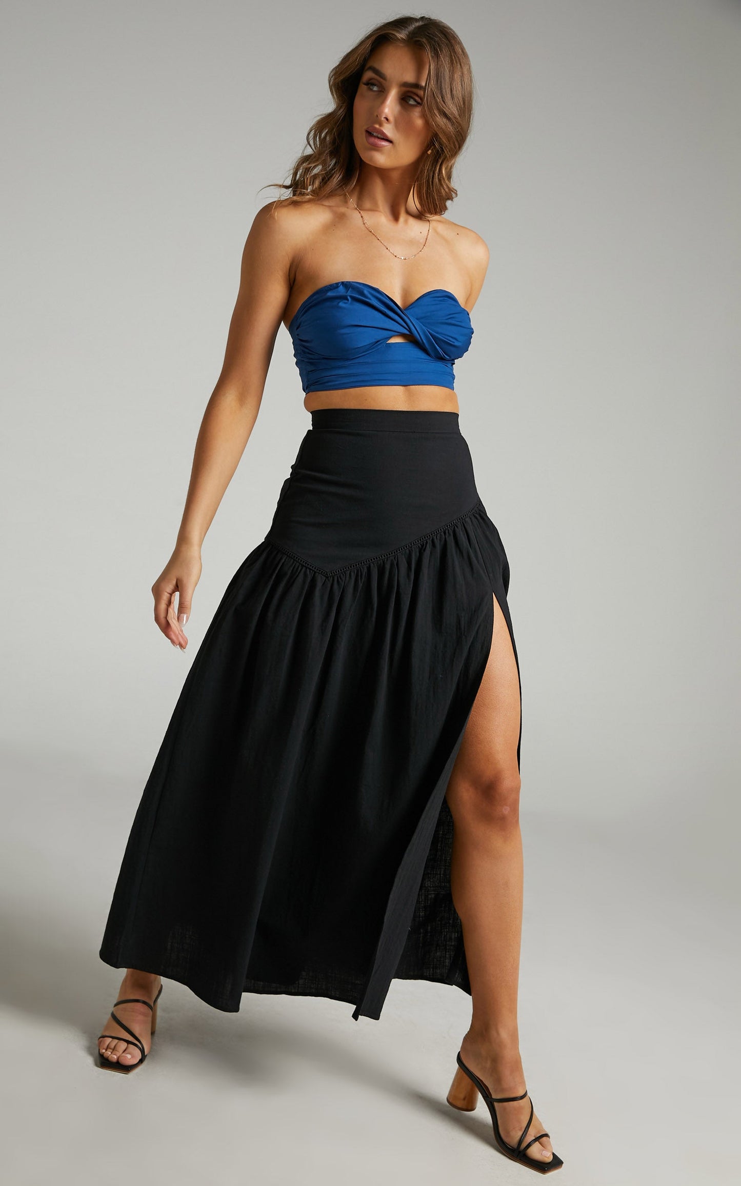 Jalena Thigh Slit Asymmetric Maxi Skirt in Black